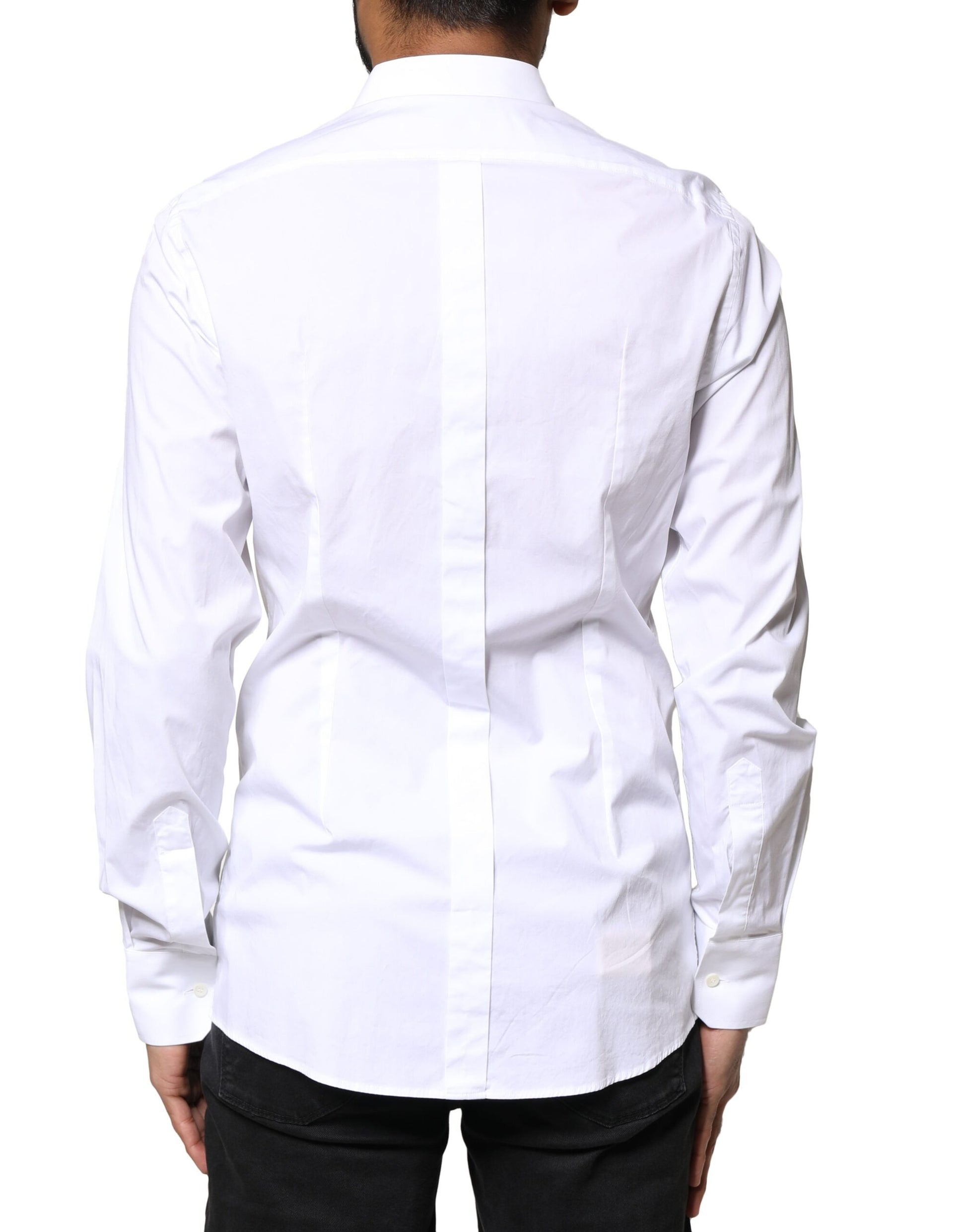 A long sleeve white dress shirt with gold accents from the brand Dolce & Gabbana