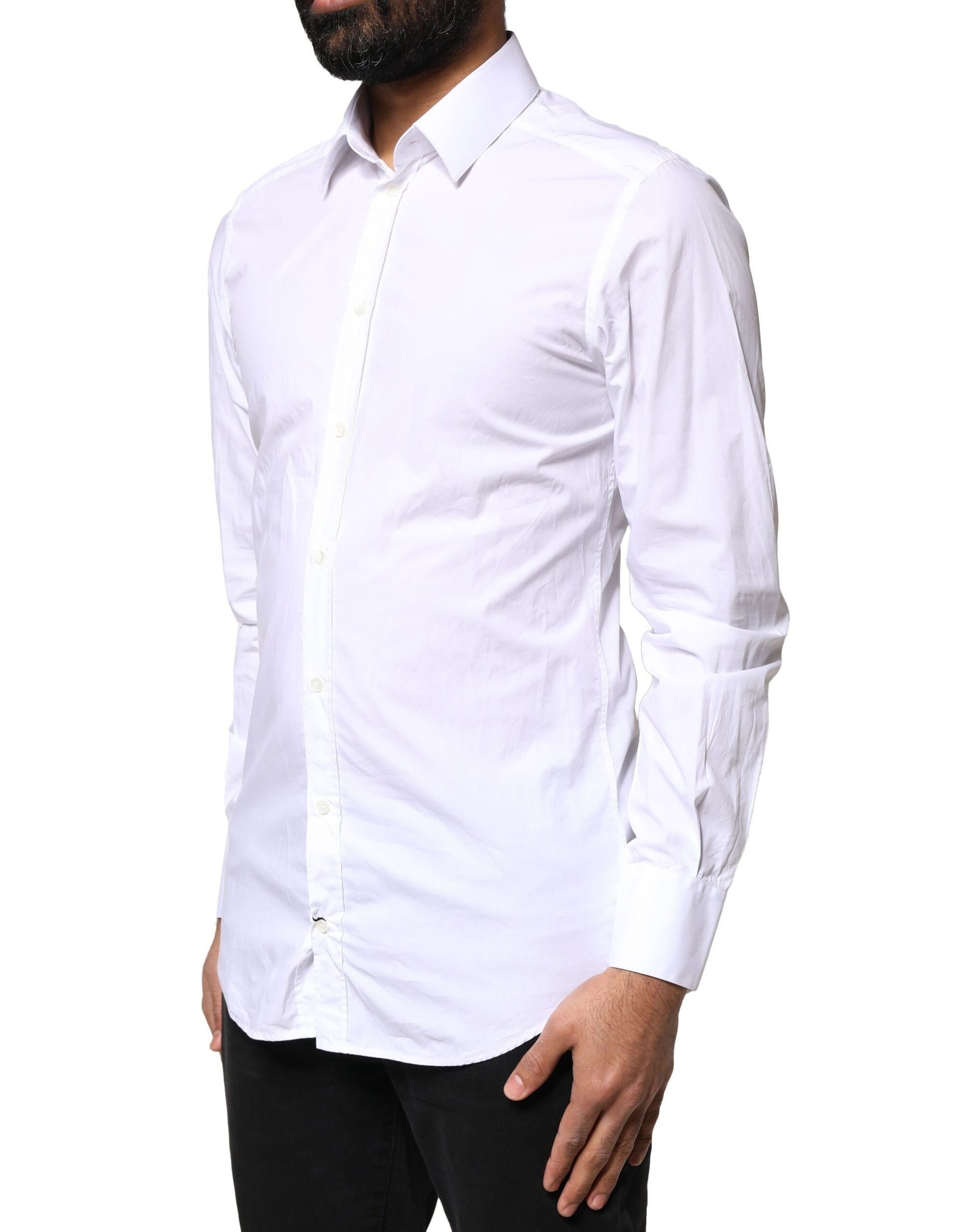 A long sleeve white dress shirt with gold accents from the brand Dolce & Gabbana