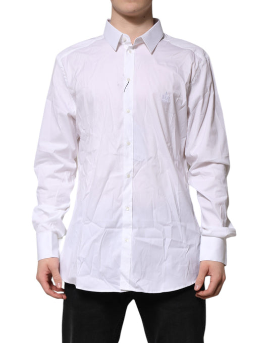 A long-sleeved white shirt with a gold pattern, part of the Dolce & Gabbana men's formal wear collection