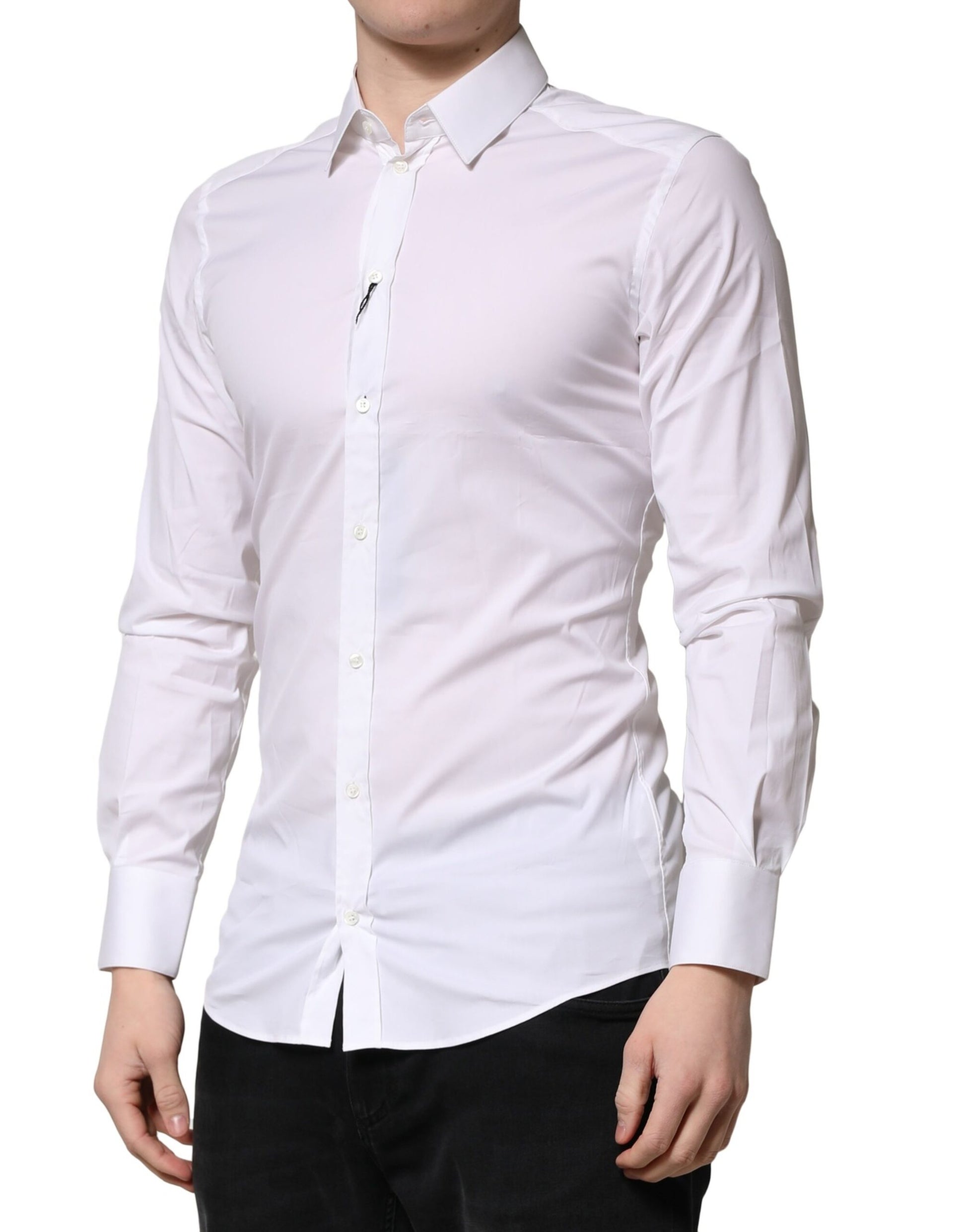 A mannequin wearing a white cotton shirt with gold accents, designed by Dolce & Gabbana