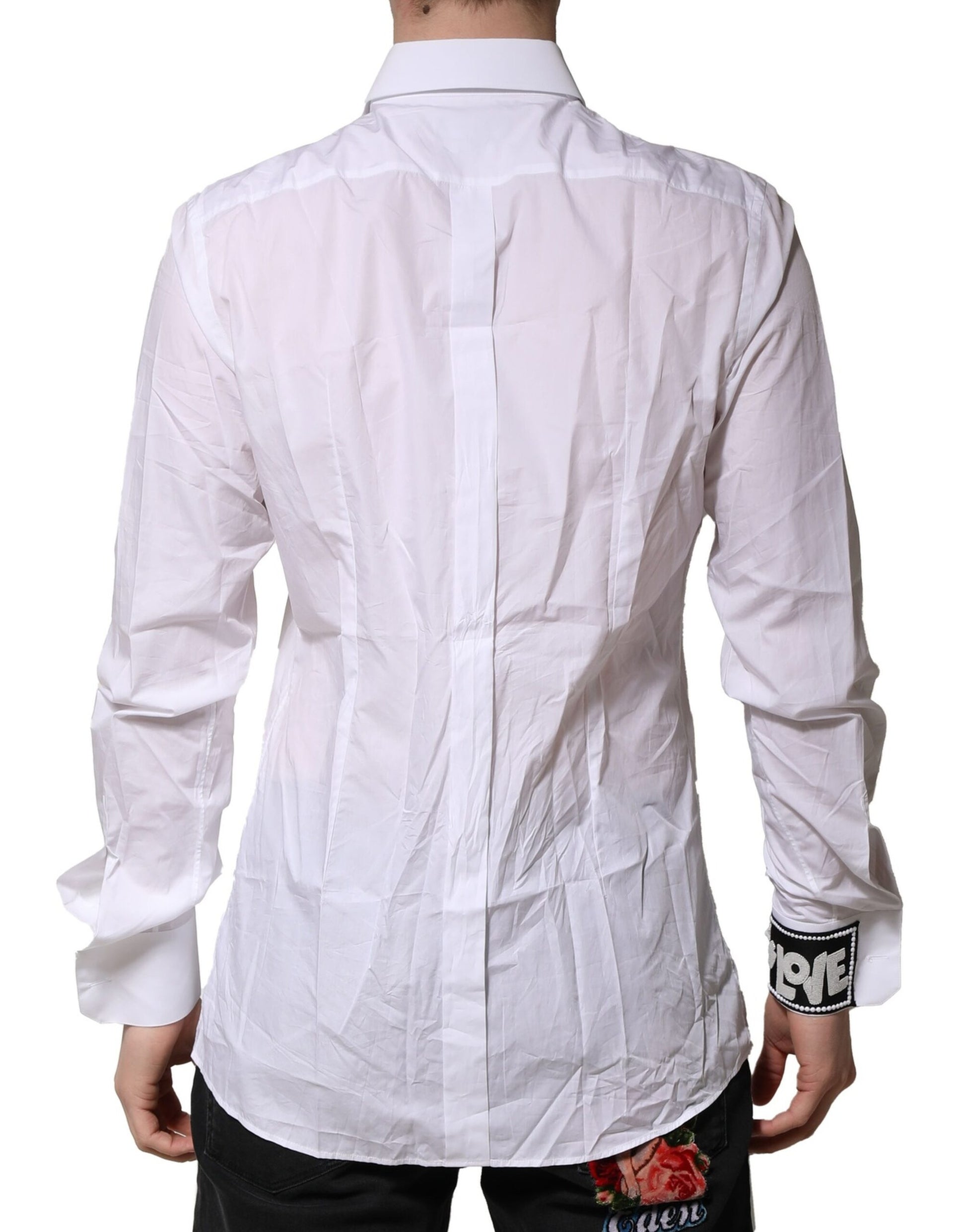 A white cotton men's dress shirt with a gold design, part of the Dolce & Gabbana collection