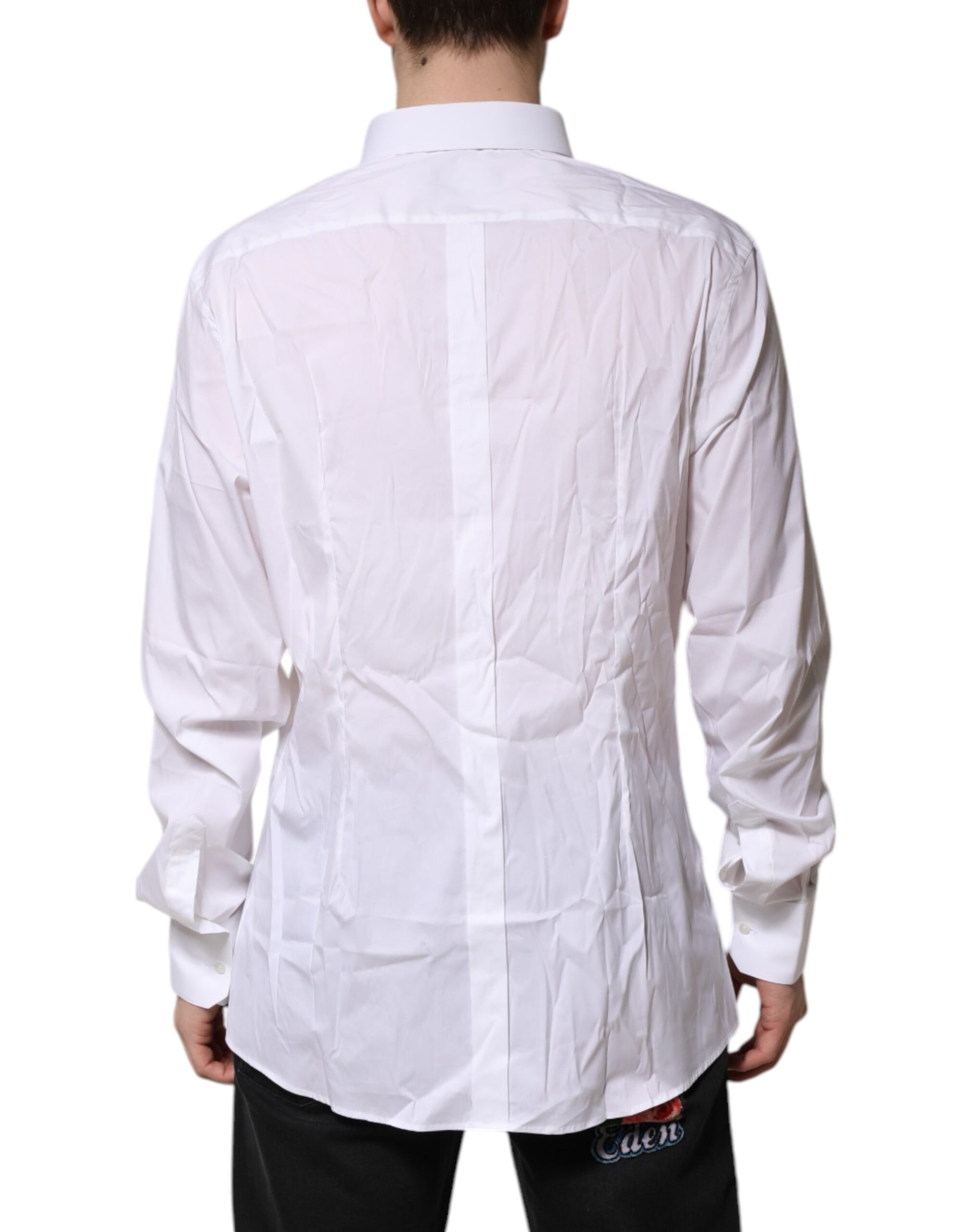 A white cotton men's dress shirt with gold accents, featuring a collar and long sleeves