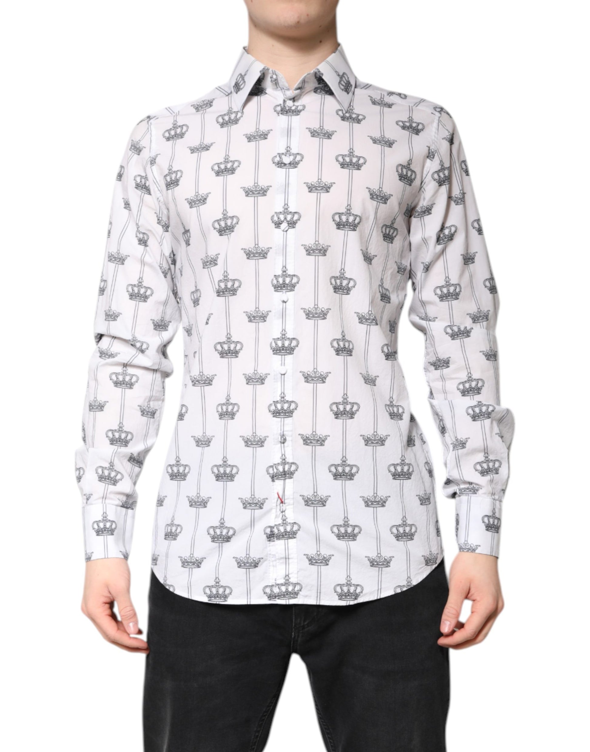 A long-sleeved shirt with a gold crown pattern on a white background