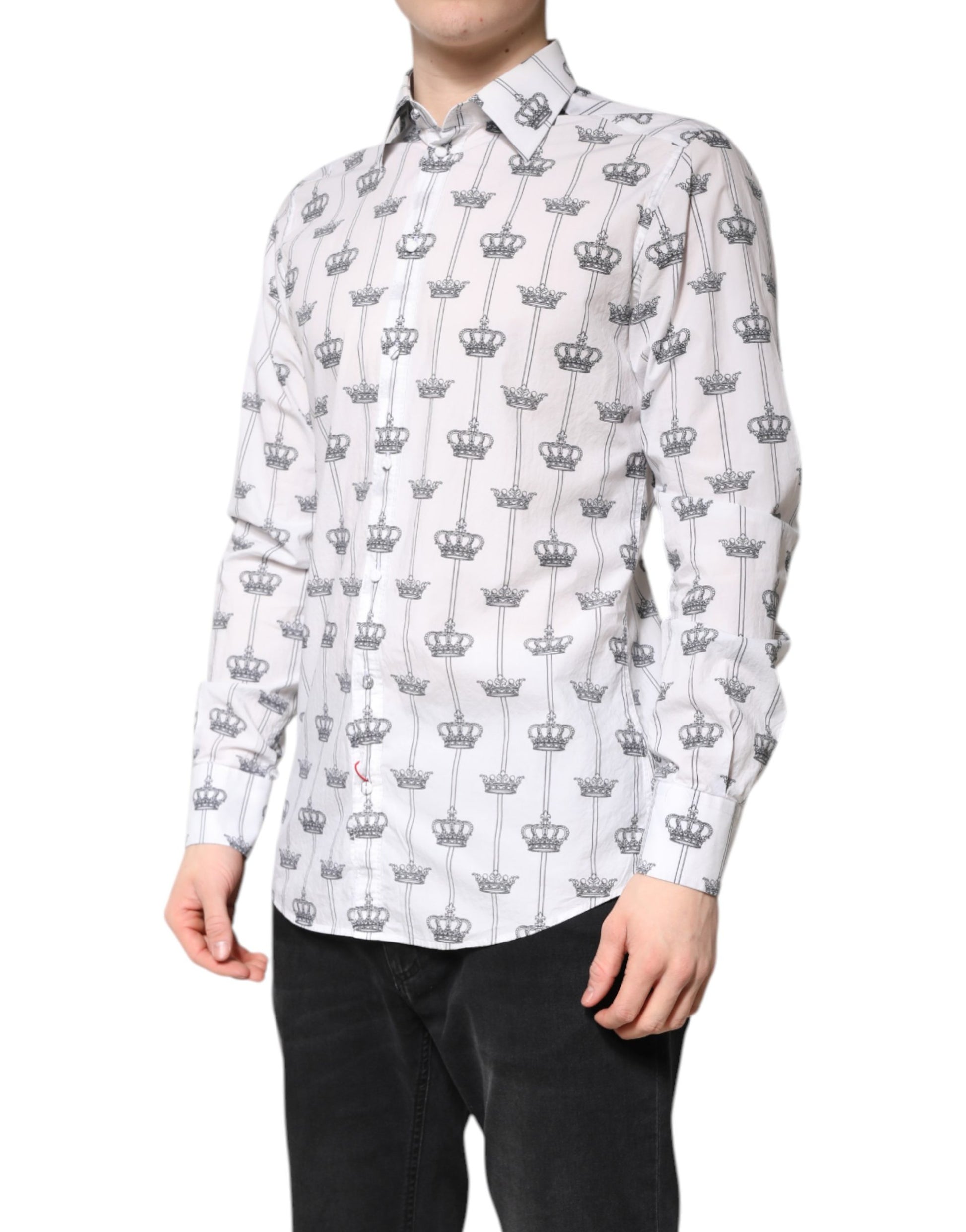 A white shirt with a gold crown pattern on it, part of the Dolce & Gabbana collection