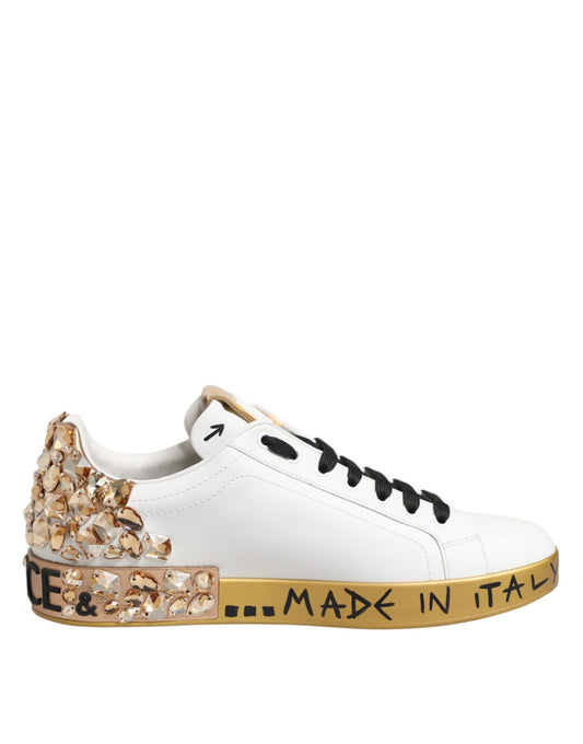 White sneaker with gold accents and sparkly embellishments on heel