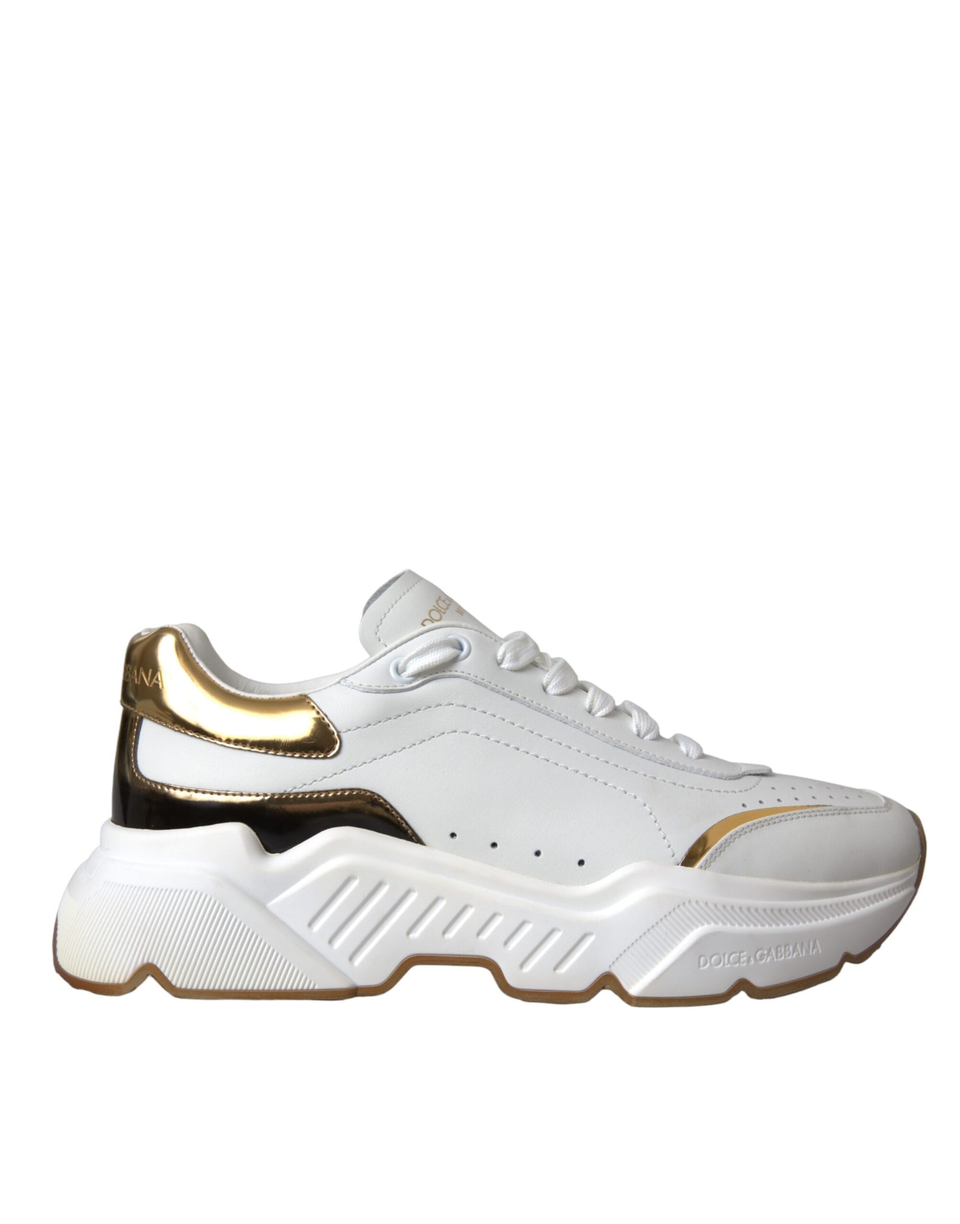 White sneaker with gold accents and black laces