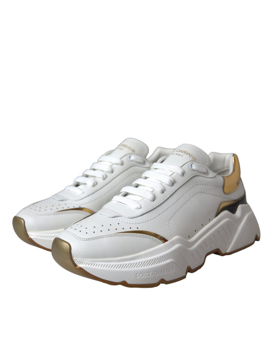 White sneakers with yellow accents and white laces