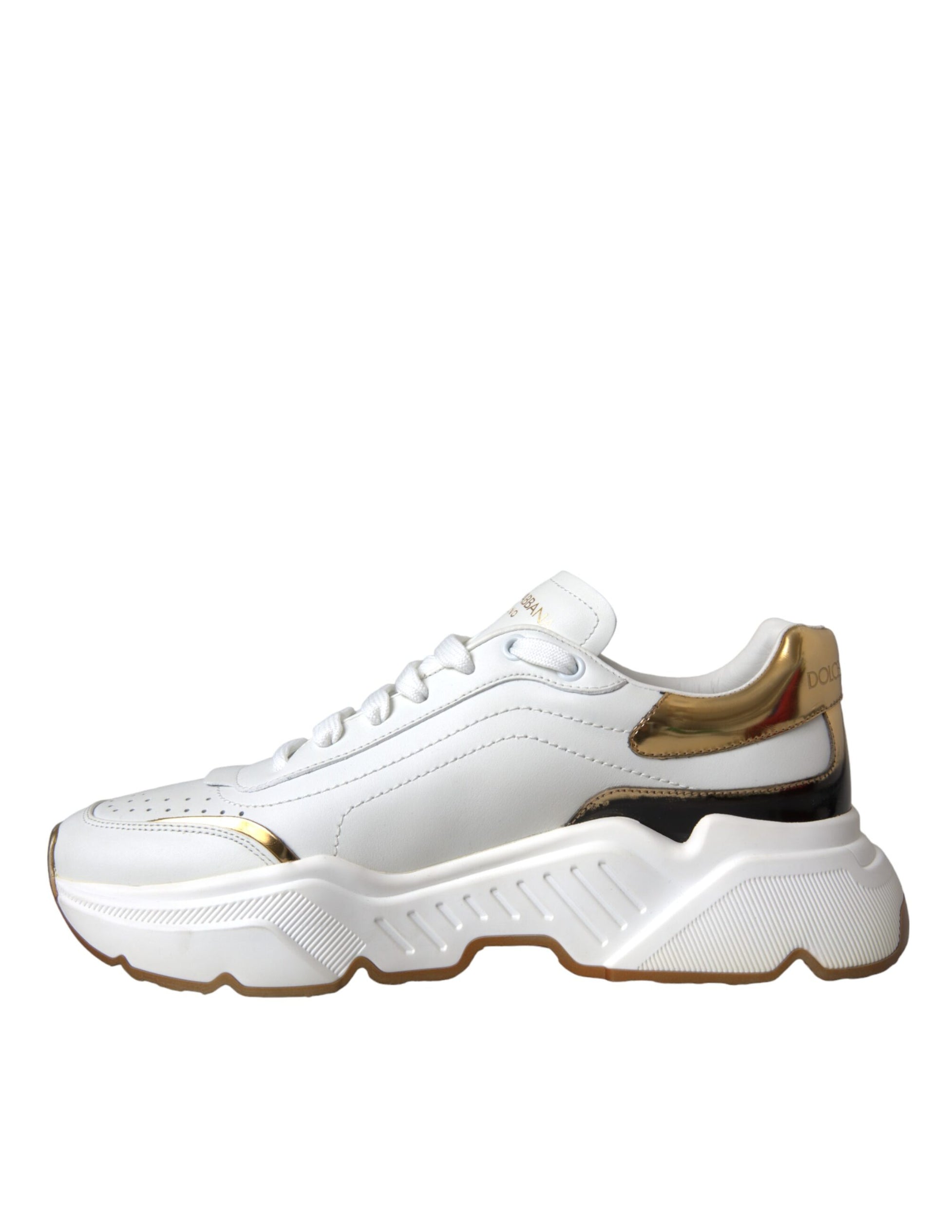 White sneaker with gold accents and black laces