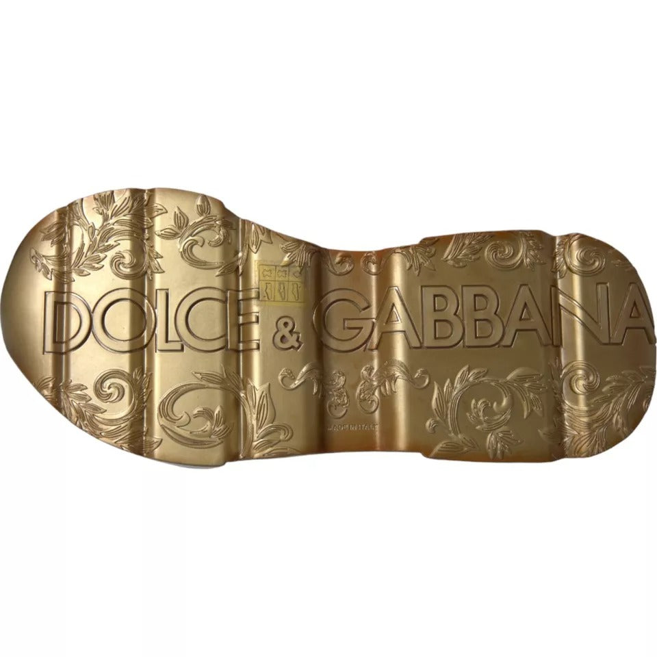 Gold shoe with embossed brand names and design elements