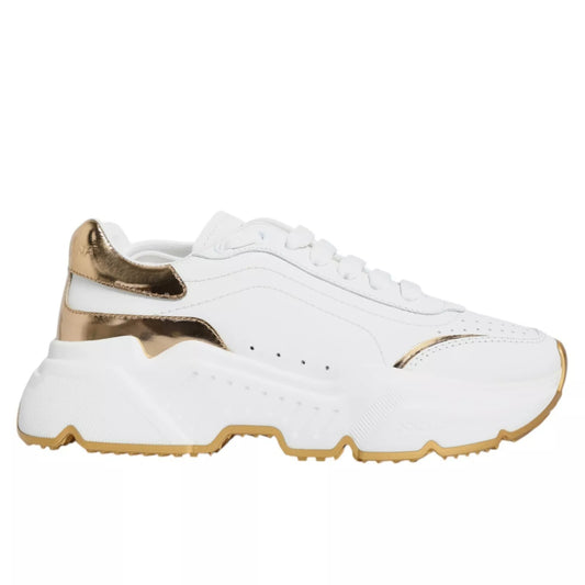 White sneaker with gold accents