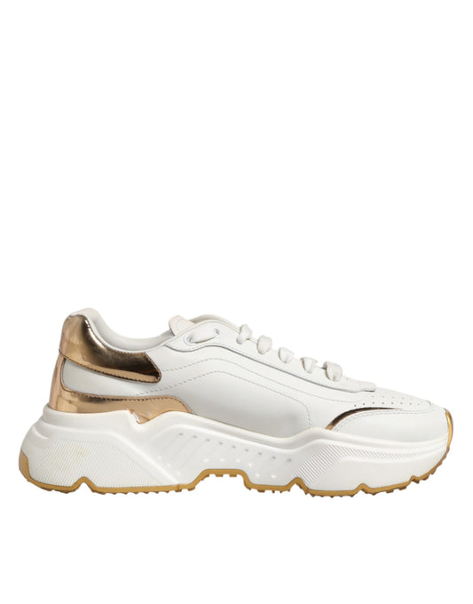 White sneaker with gold accents