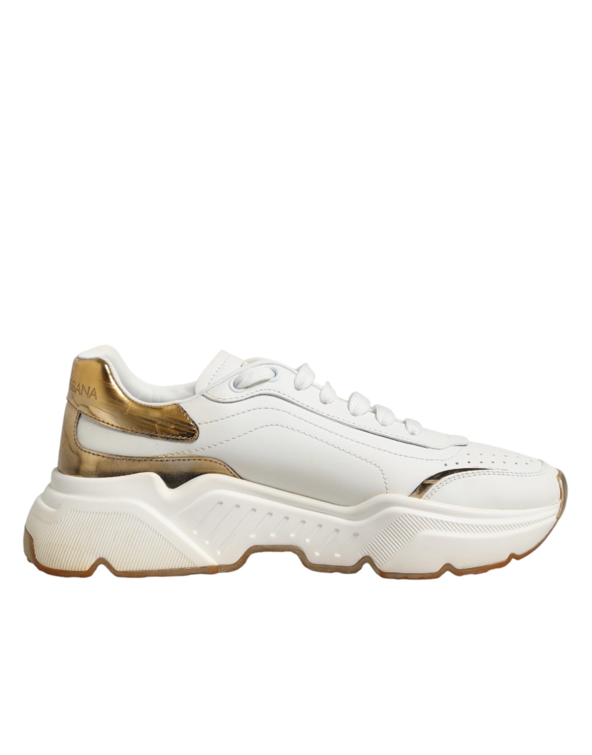 White gold low top sneakers with white soles