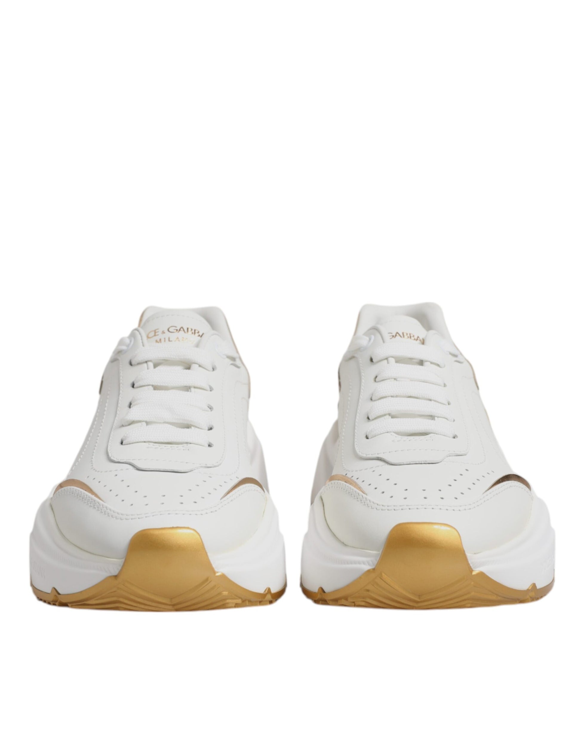 White sneakers with gold accents