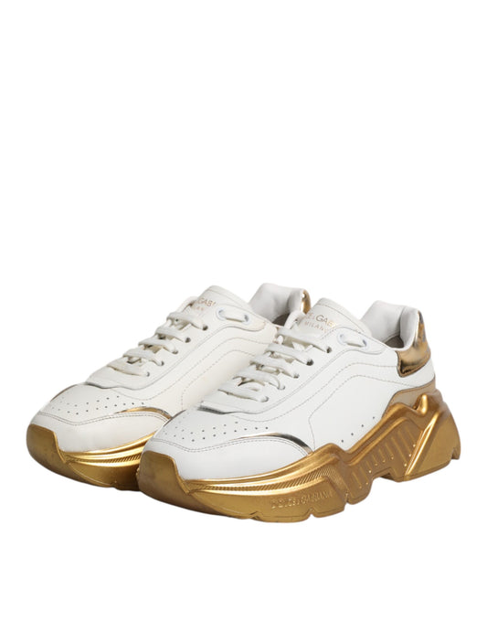 White gold sneakers with laces, low top, branded logo on side and heel