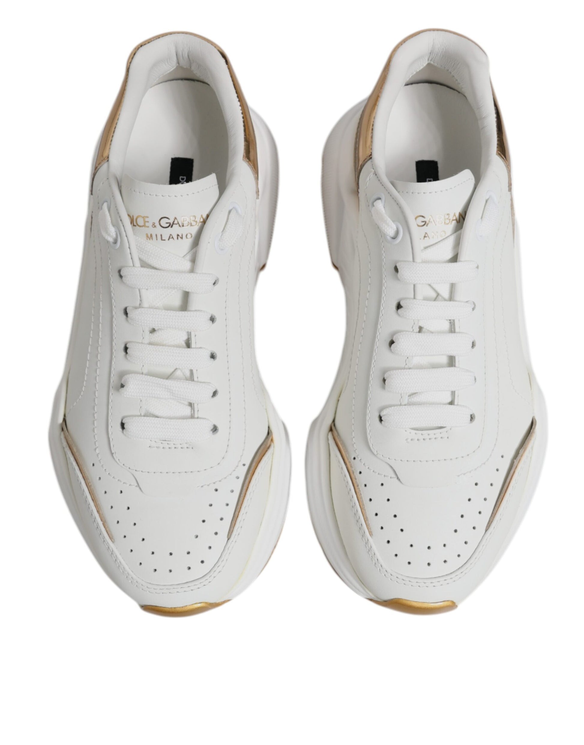 White sneakers with gold accents