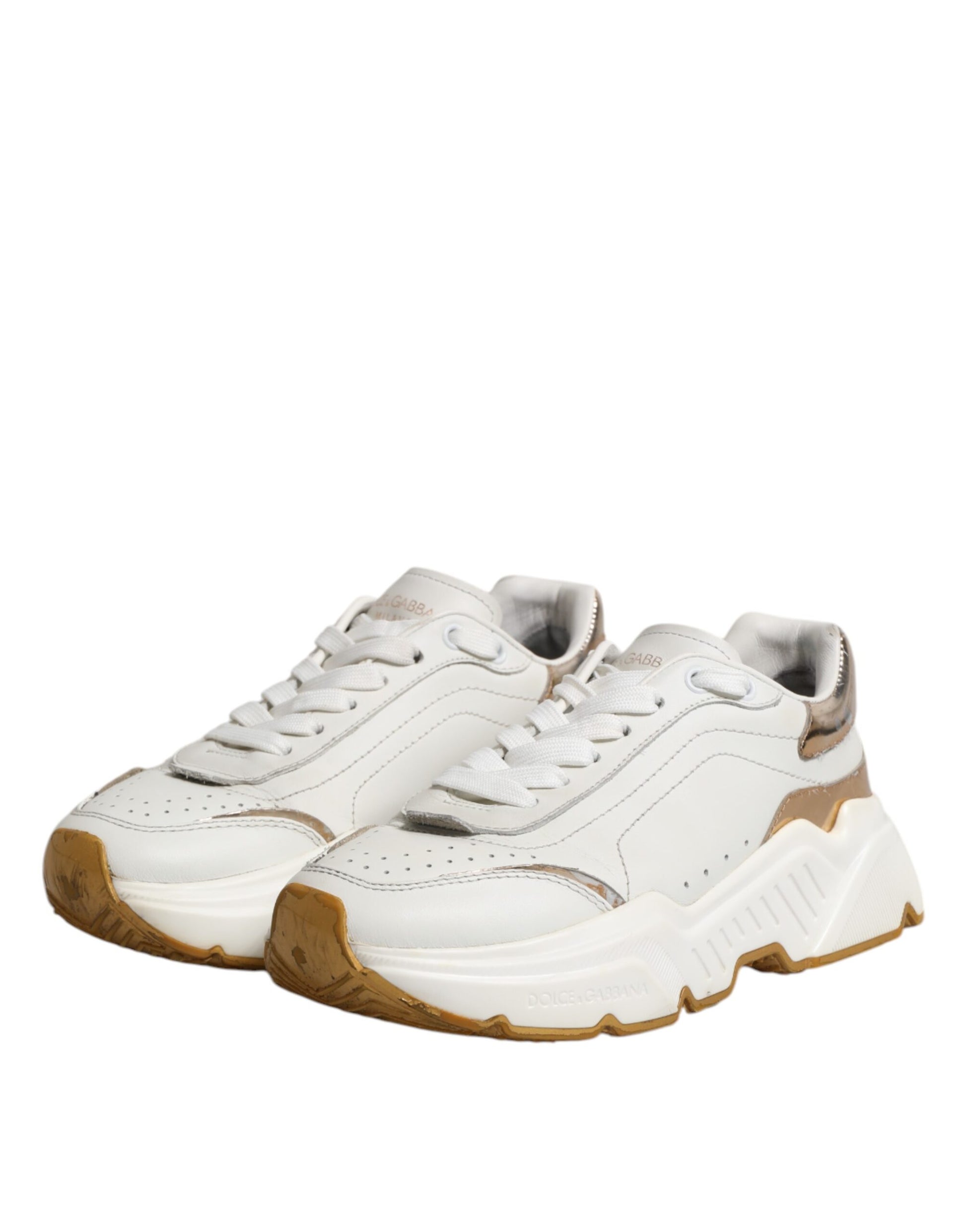 White gold sneakers with laces, branded logo on side, low top design, from Dolce & Gabbana