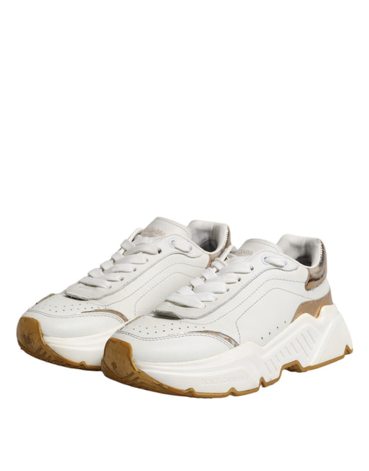White gold sneakers with laces, branded logo on side, low top design, from Dolce & Gabbana