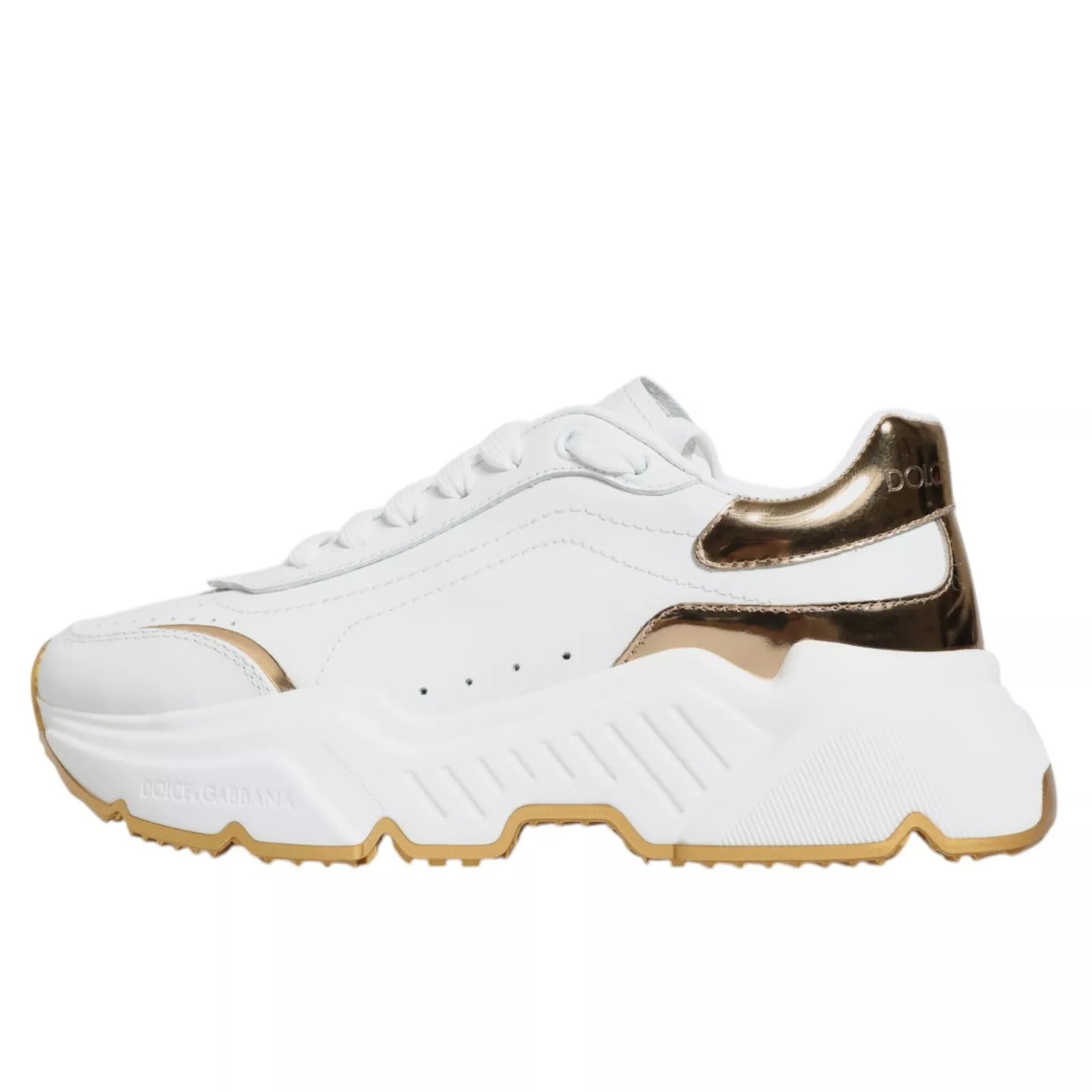 White sneaker with gold accents
