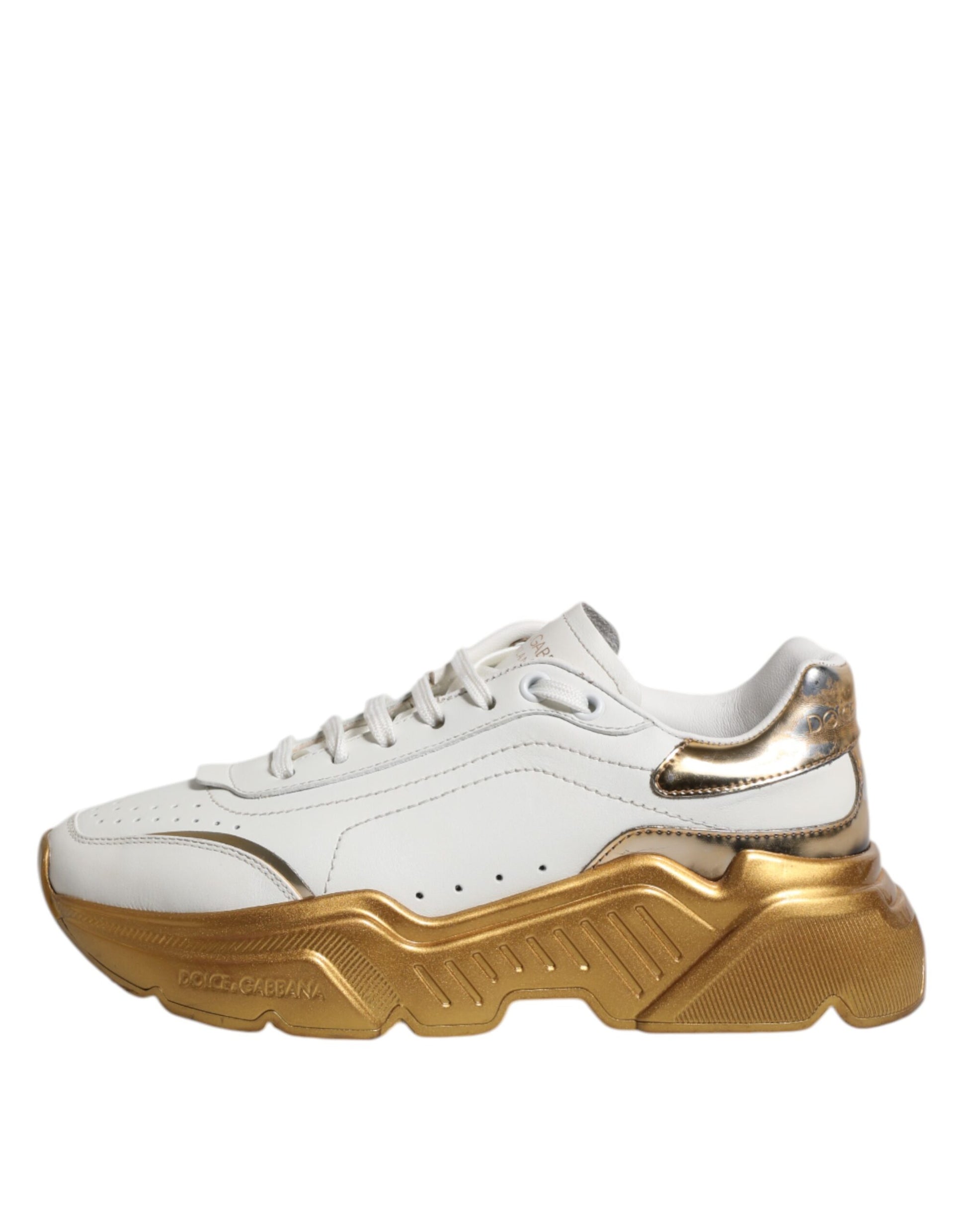 White gold D&G sneakers with low top, laces, and logo on side