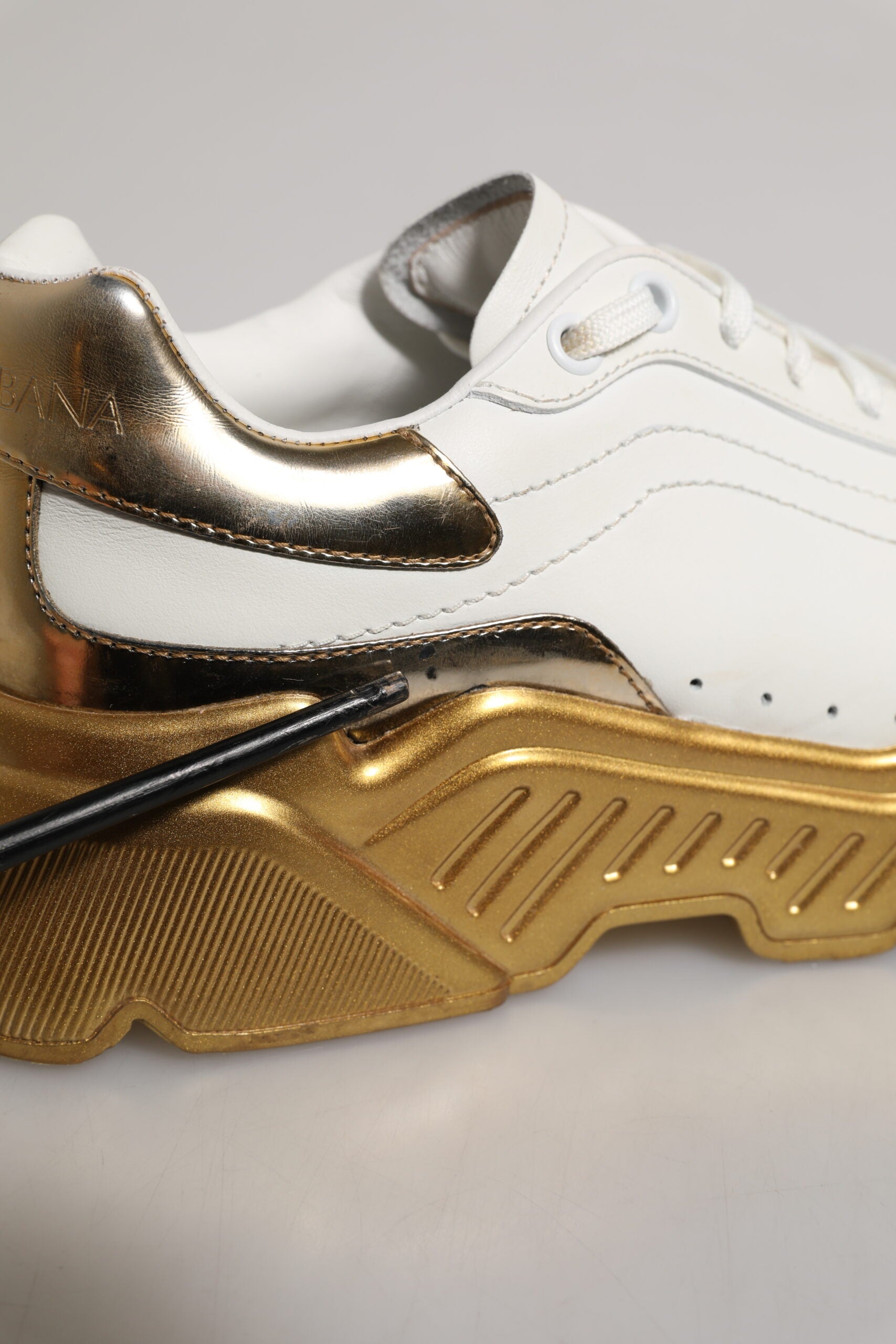White gold D&G sneakers with laces, low top, daymaster style, white and gold colorway