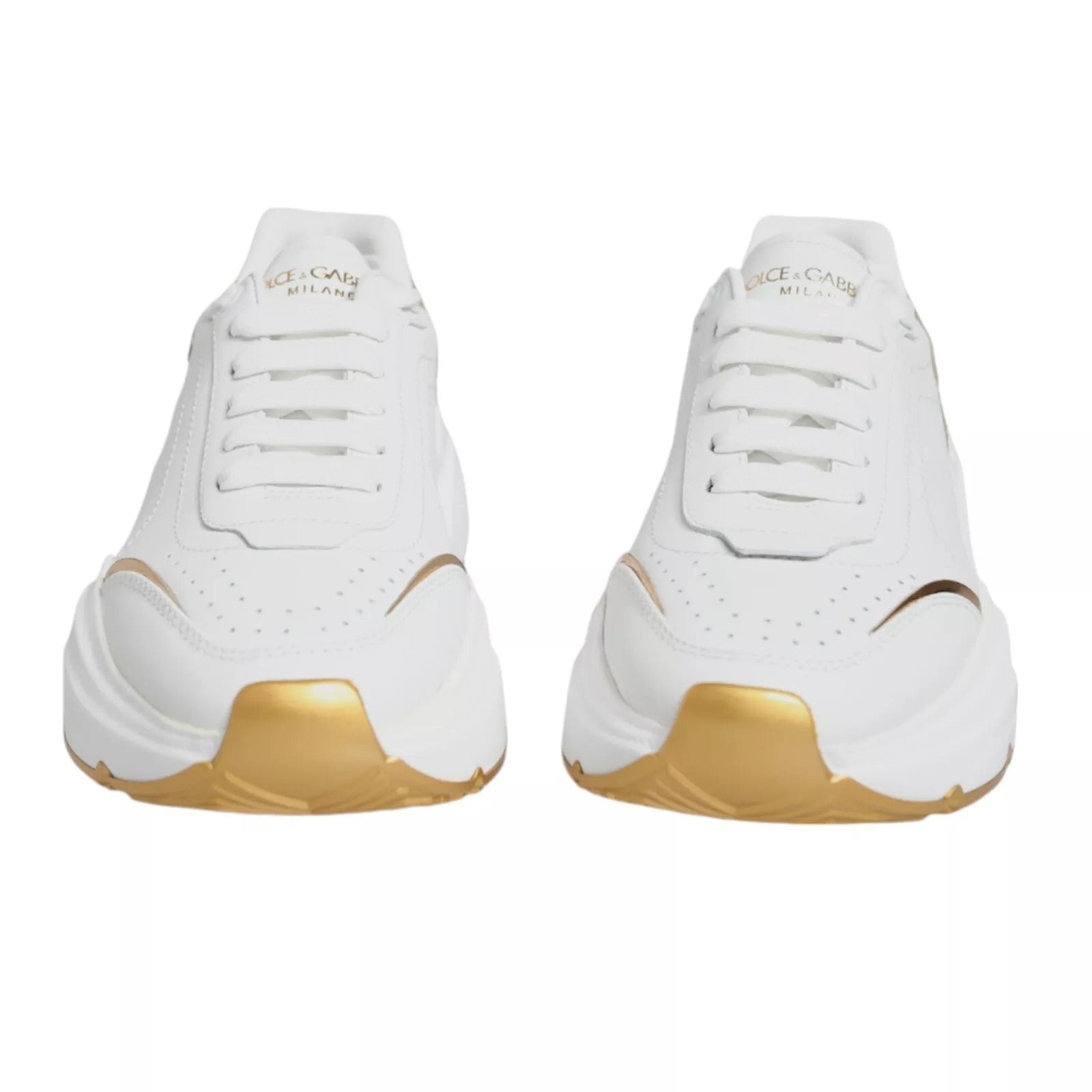 White sneakers with gold accents