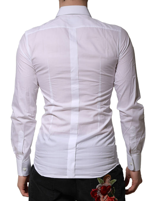 A white dress shirt with gold embellishments and a rose on the lapel