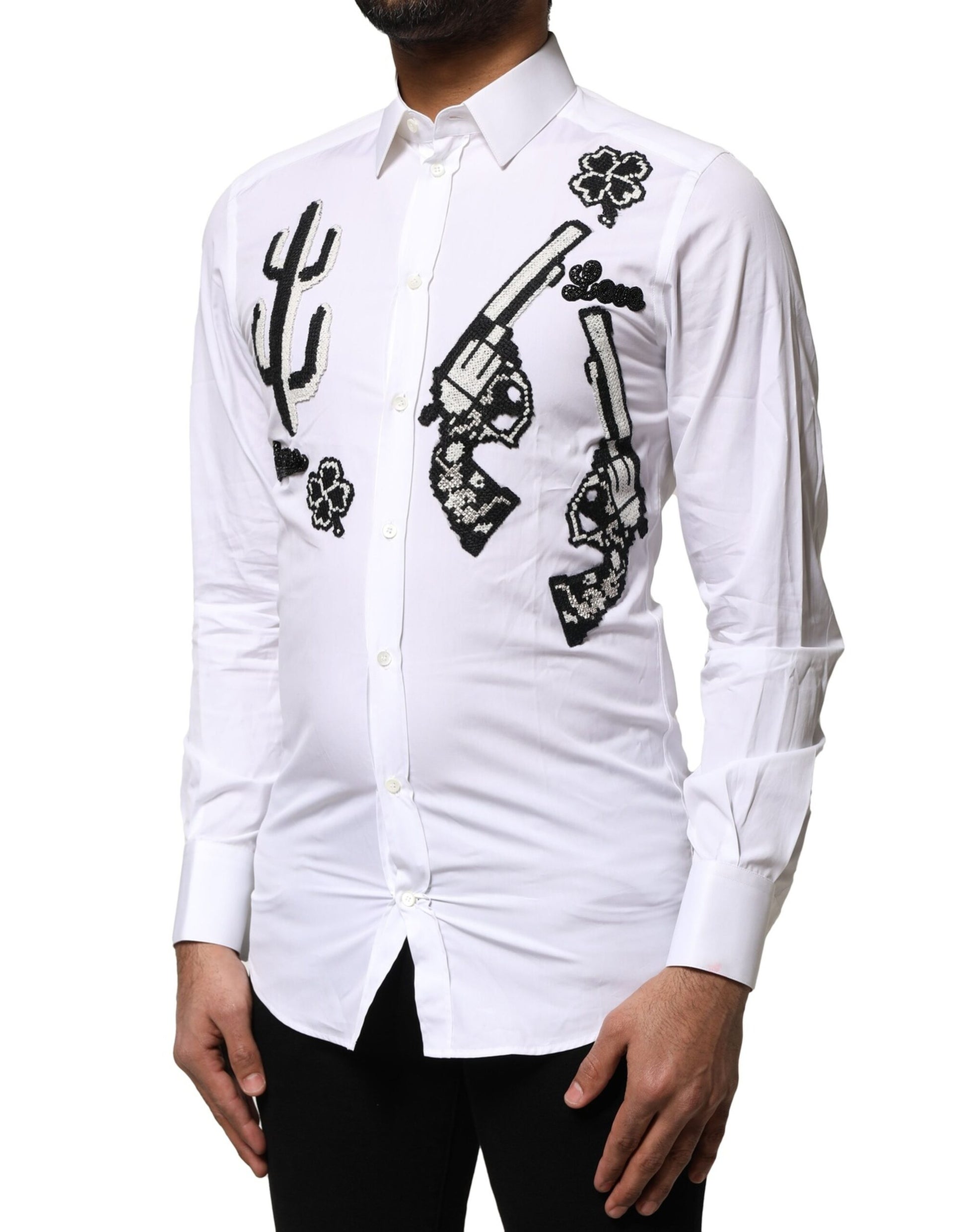A white dress shirt with gold embroidery detailing