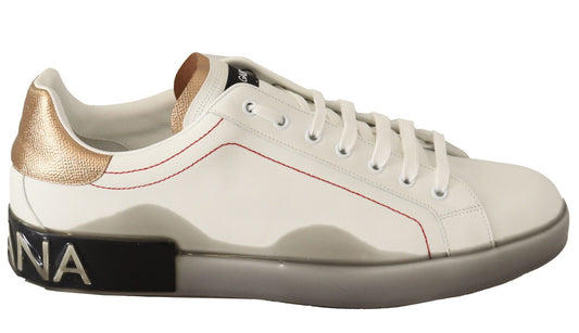 White sneaker with gold accents and red trim