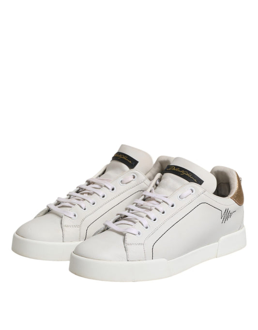 White sneakers with black laces and a logo on the side