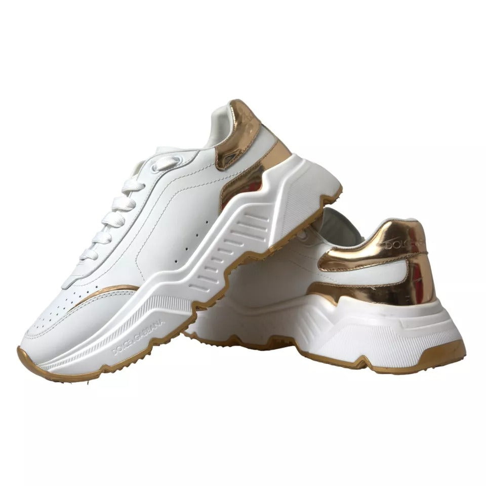 White gold leather men's sneakers with laces, featuring a logo on the side and a chunky sole