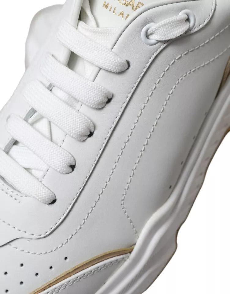 White gold leather men's sneakers with laces and a logo on the tongue