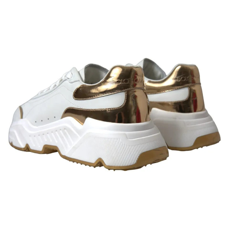 White gold leather men's sneakers with laces, featuring a logo on the side and a textured sole