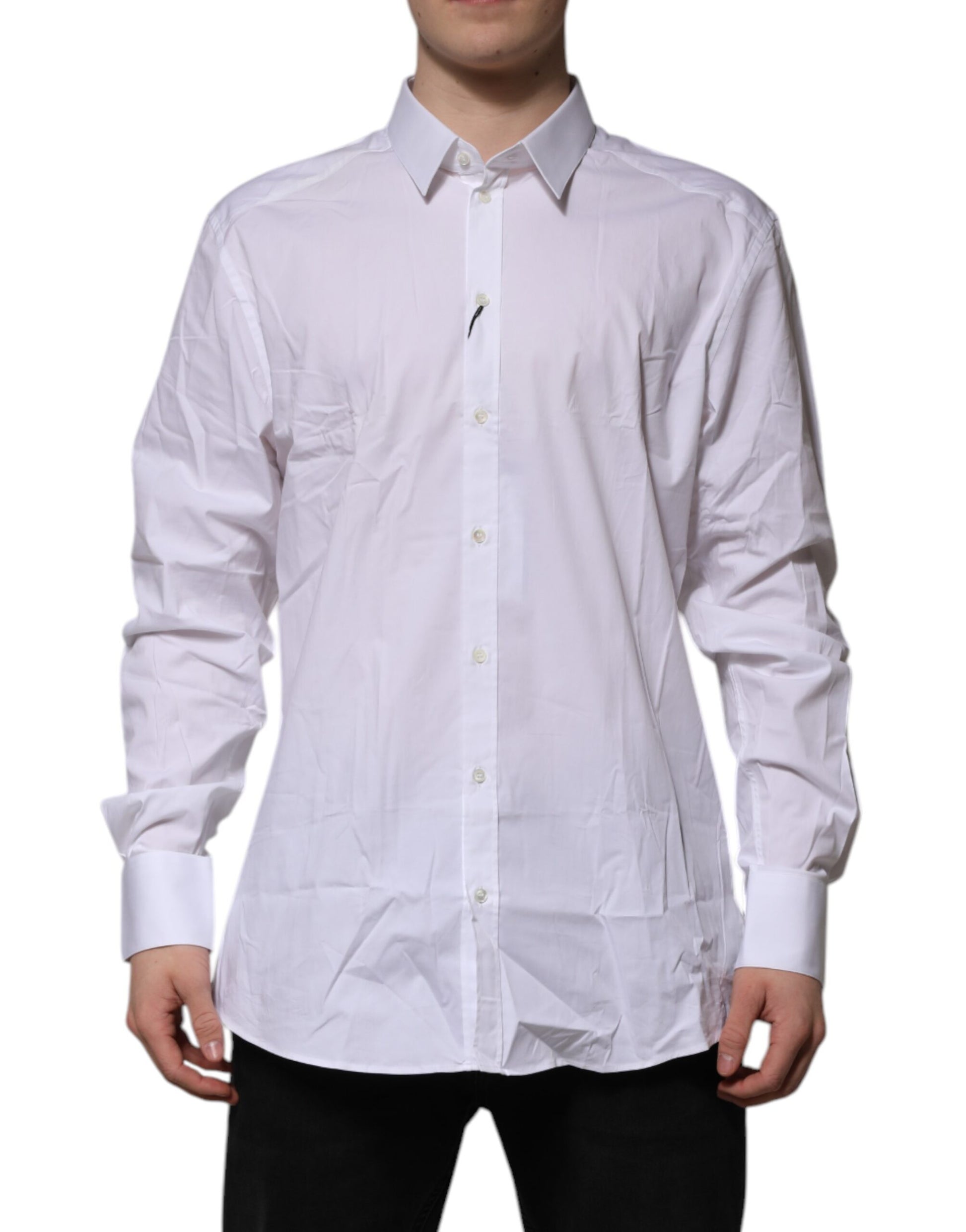 A long sleeved white dress shirt with gold accents, designed by Dolce & Gabbana