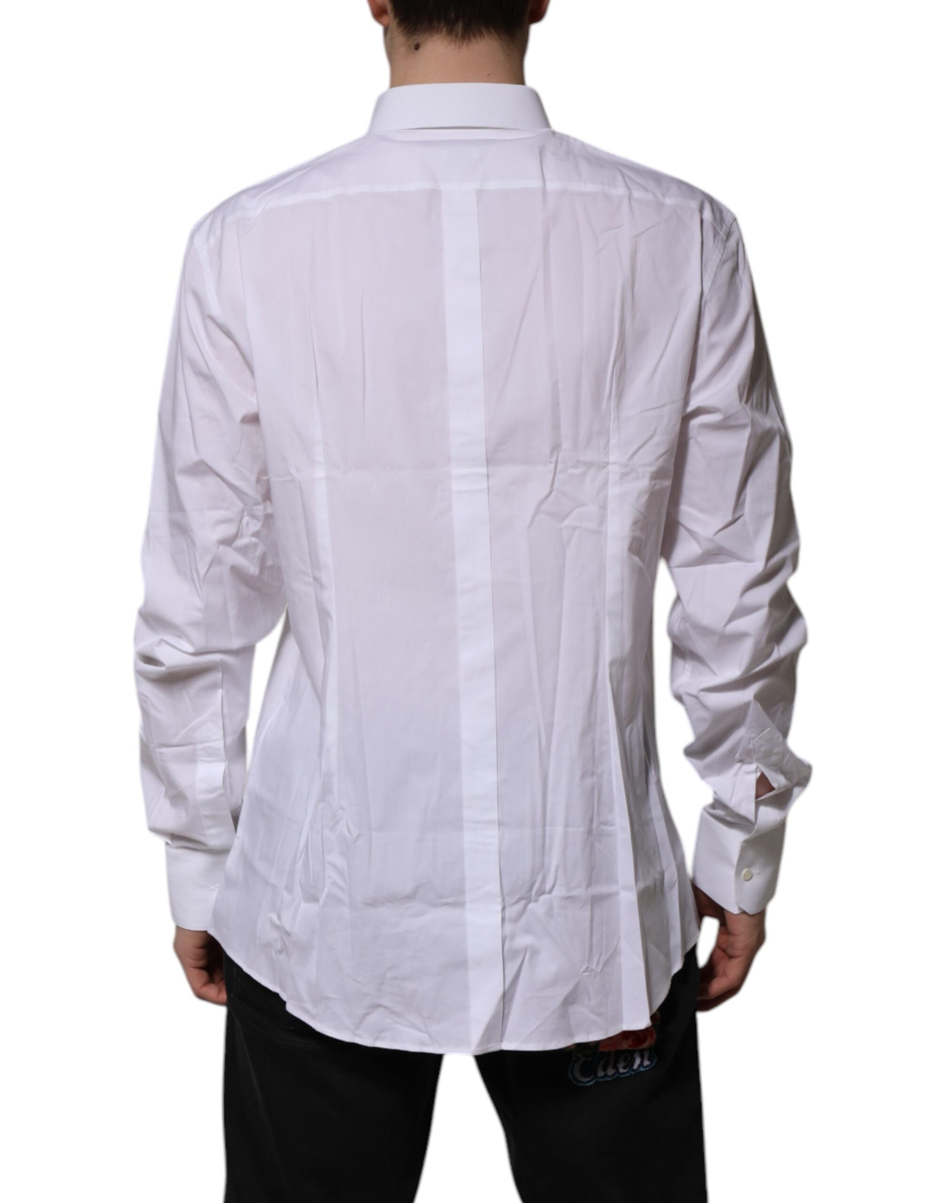 A long sleeve white dress shirt with gold accents, designed by Dolce & Gabbana