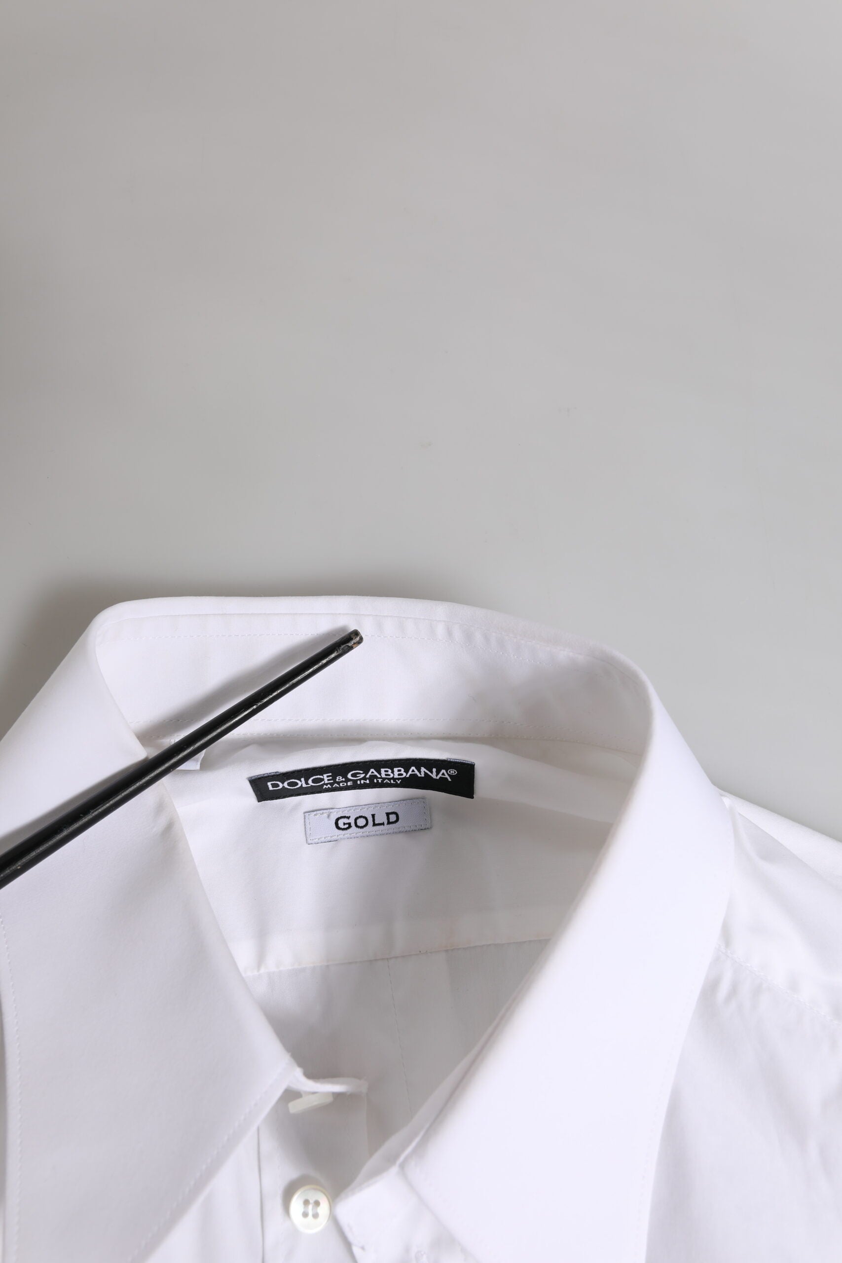White long sleeve dress shirt with gold label