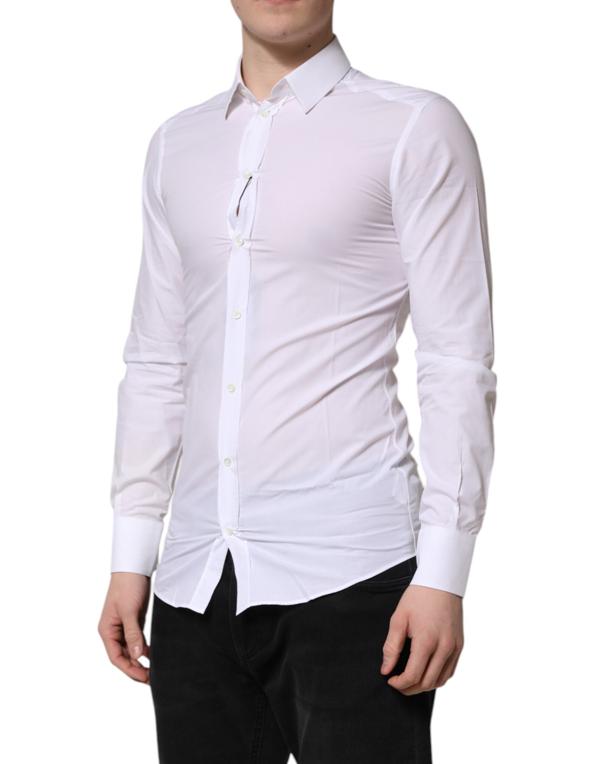 A mannequin wearing a white long sleeve dress shirt with gold accents