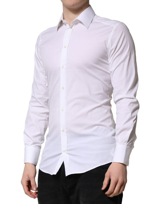 A long sleeve white dress shirt with gold accents, designed by Dolce & Gabbana