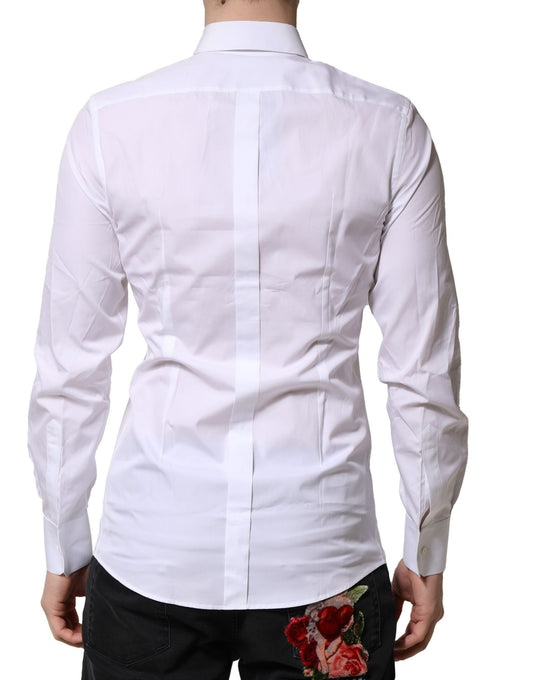 A white long sleeve dress shirt with gold accents, featuring a collar and button-up front