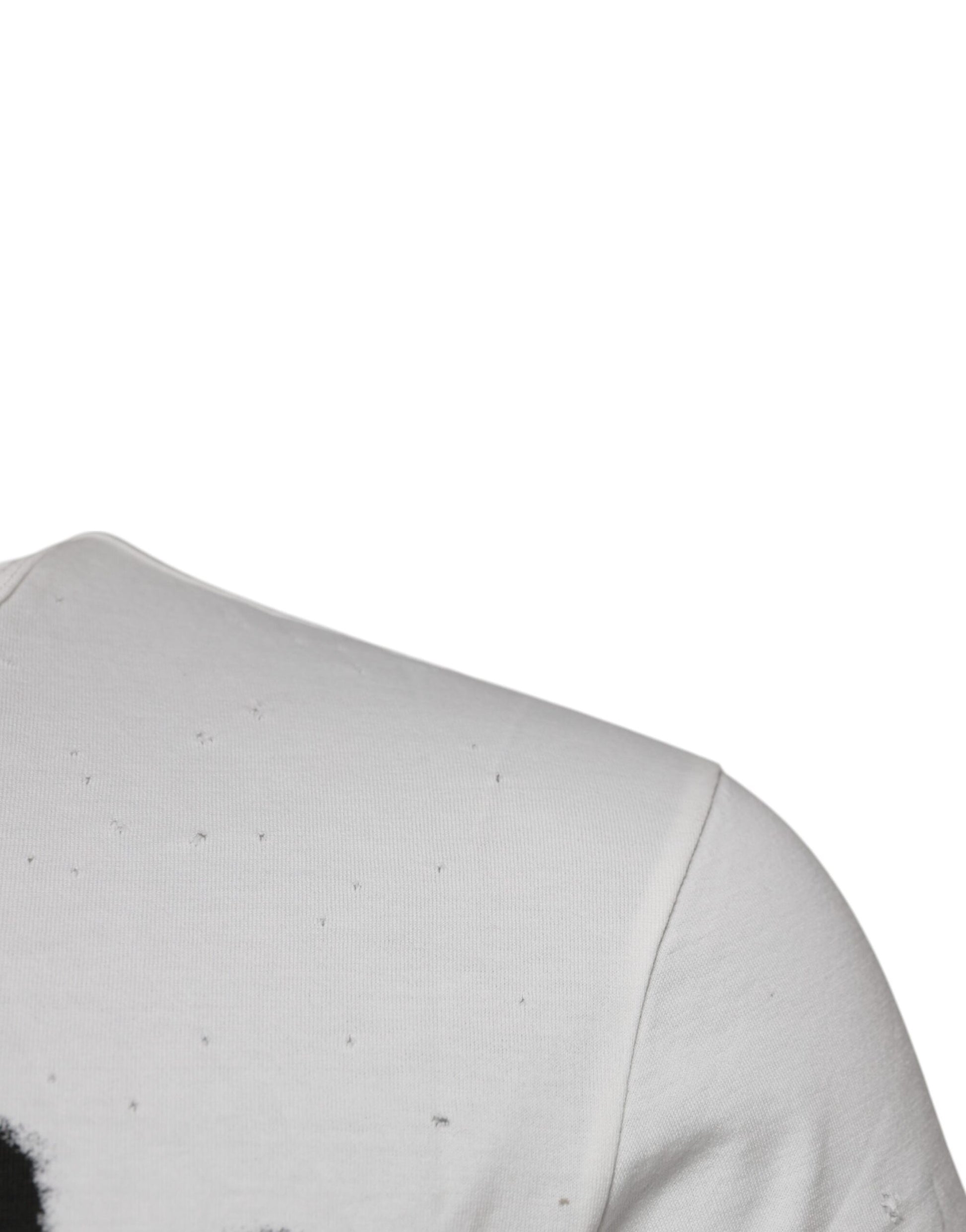 White shirt with black spots on shoulder