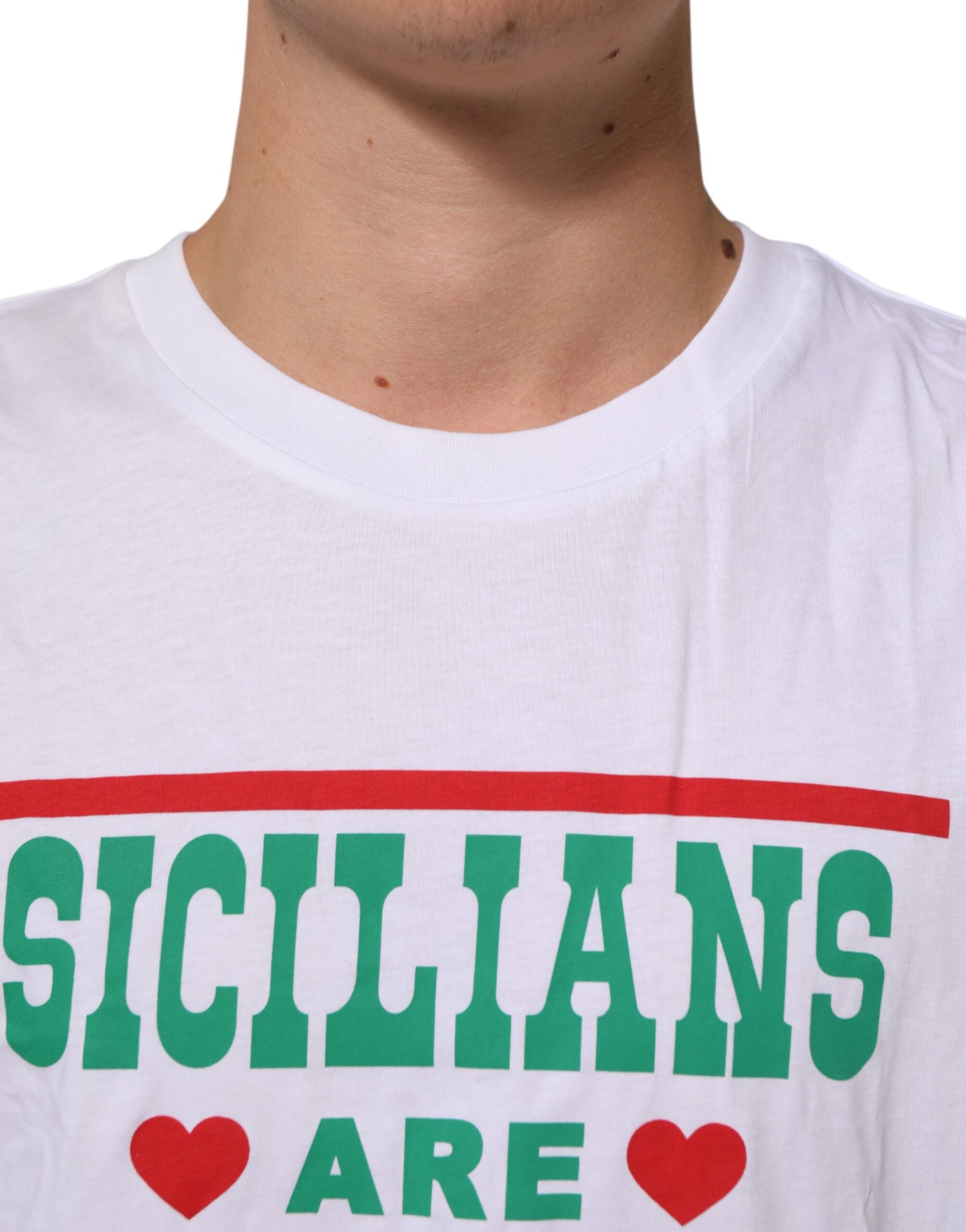 White t-shirt with green and red lettering