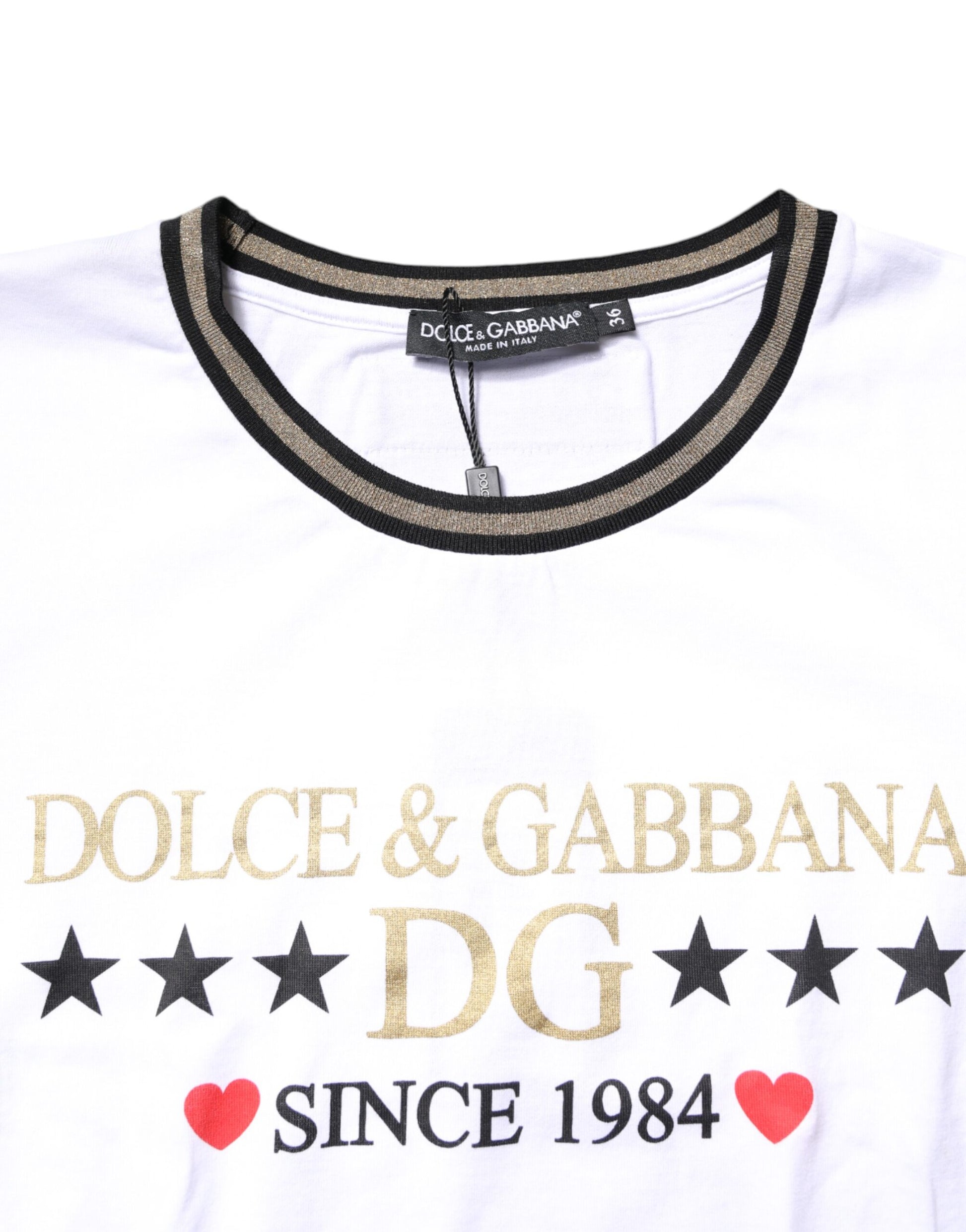 White t-shirt with black and gold graphic design featuring brand names