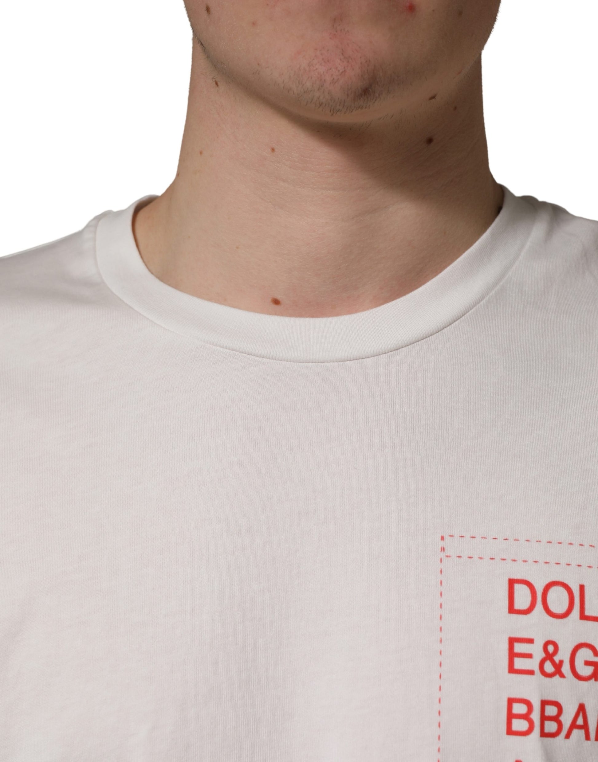 White t-shirt with red lettering on front