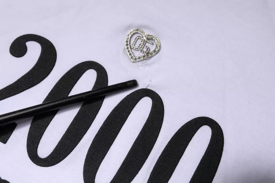 Heart shaped charm on a white t-shirt