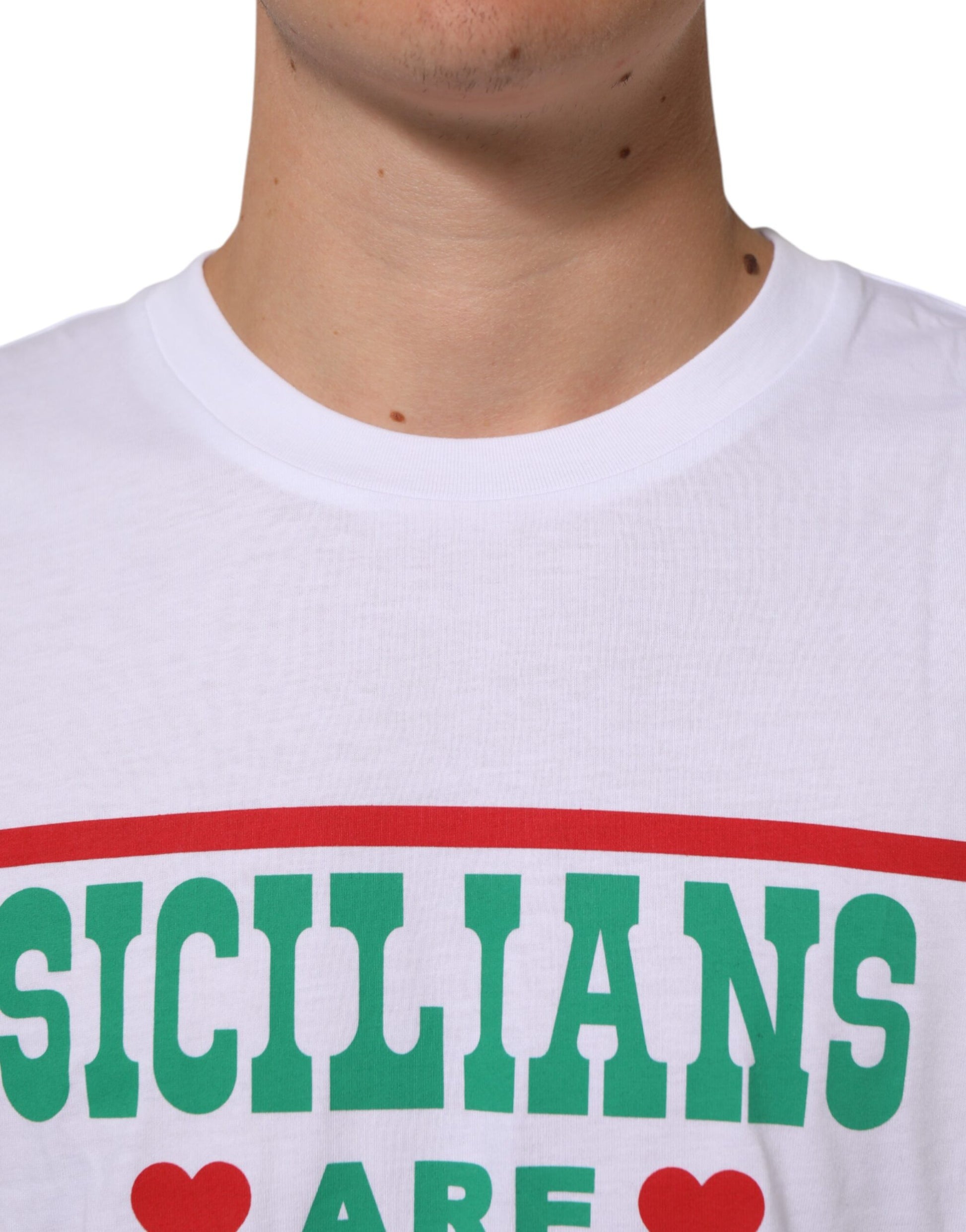 White t-shirt with red and green writing