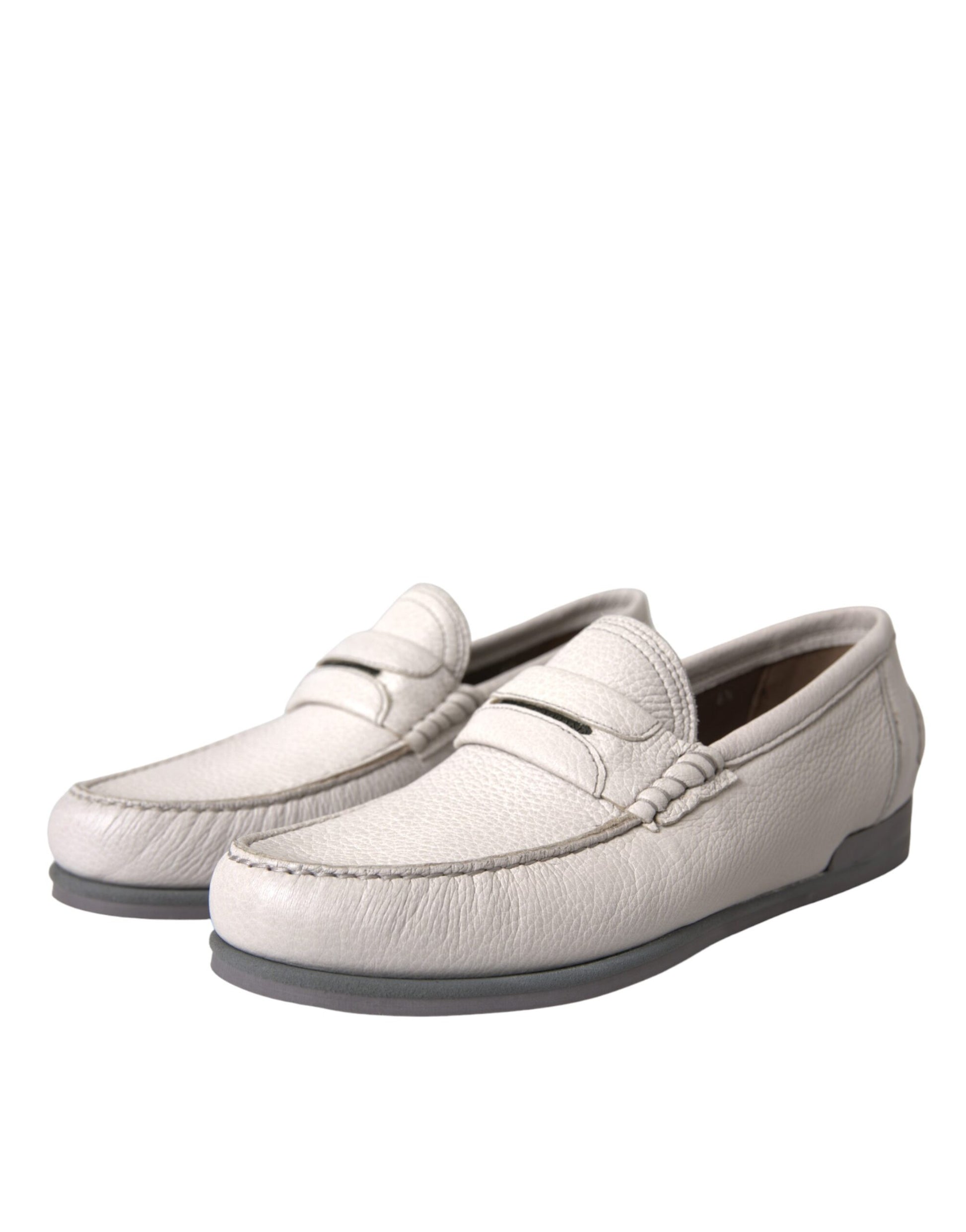 Pair of white leather loafers