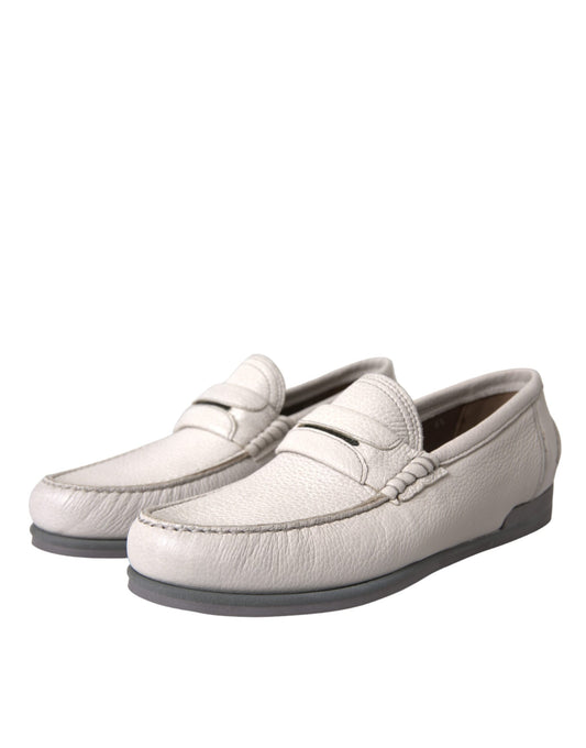 Pair of white leather loafers