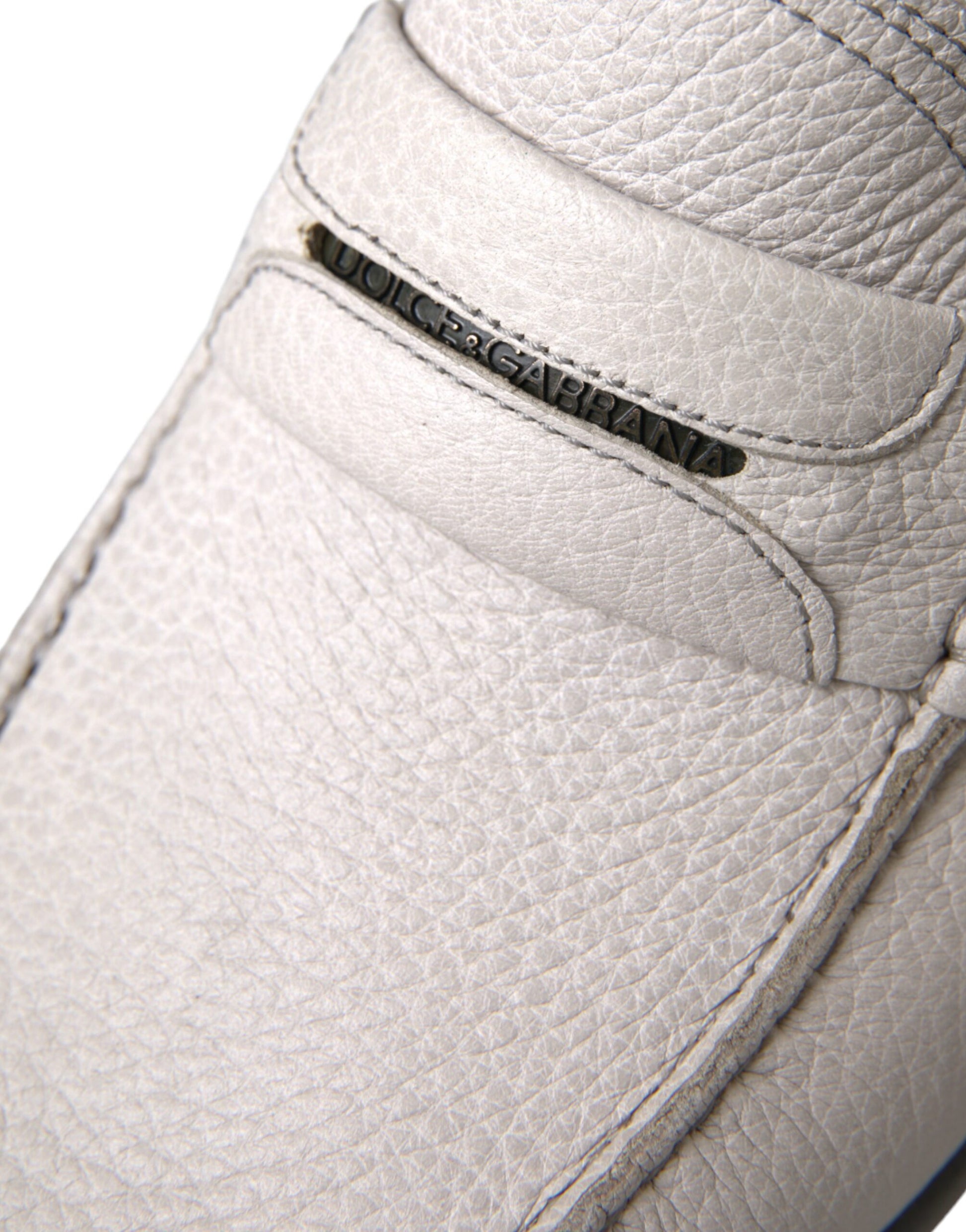 White leather shoe with a zipper on the side