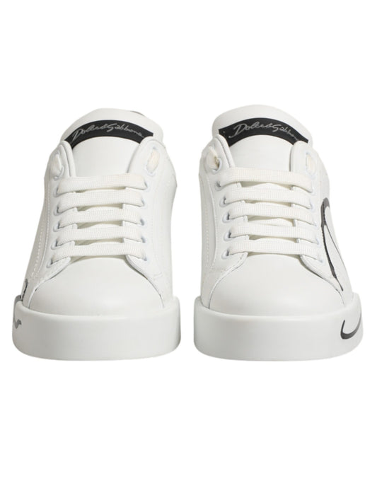 Pair of white sneakers with gray accents, featuring a low top and leather material