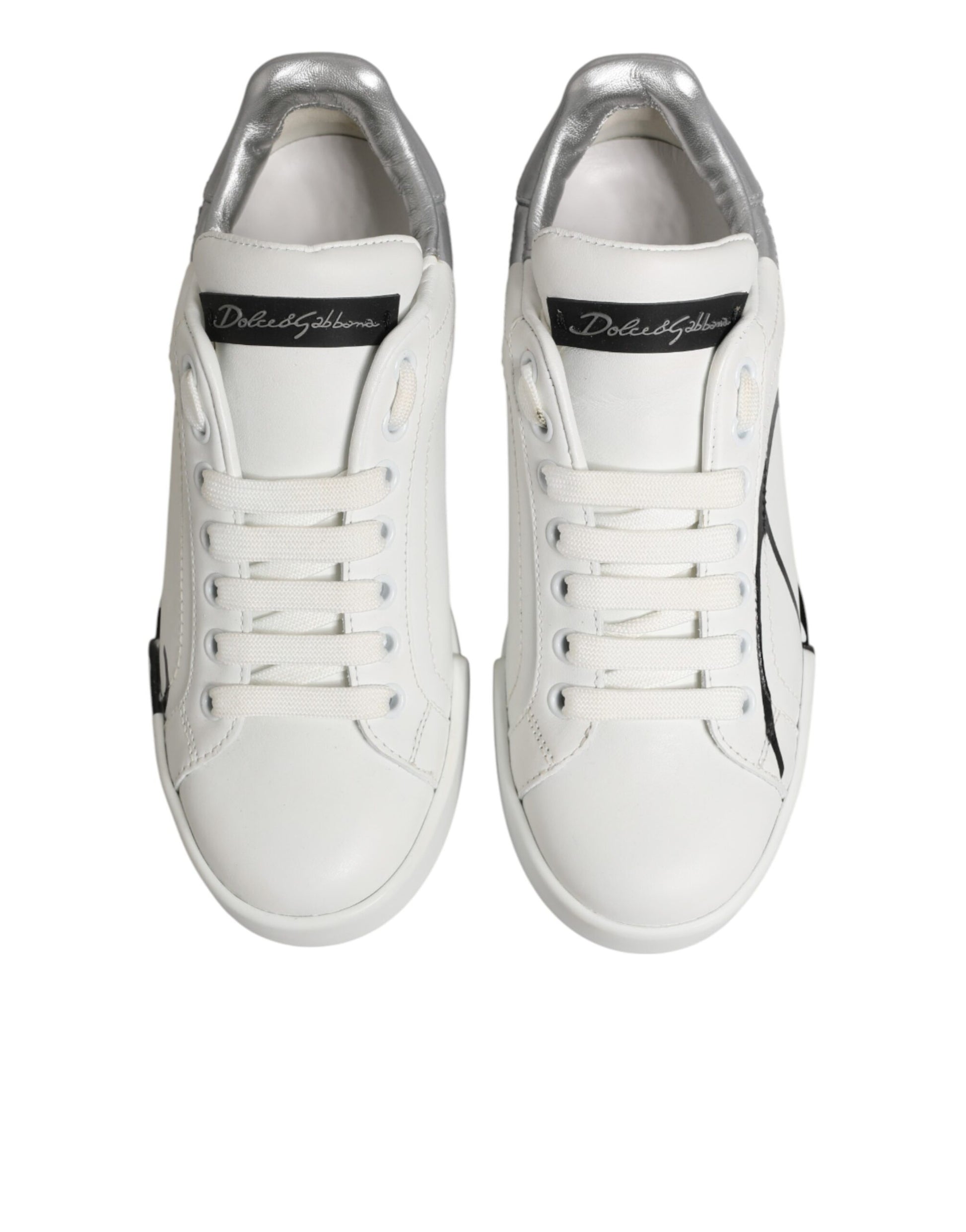 Pair of white sneakers with gray accents, featuring a low top and leather material