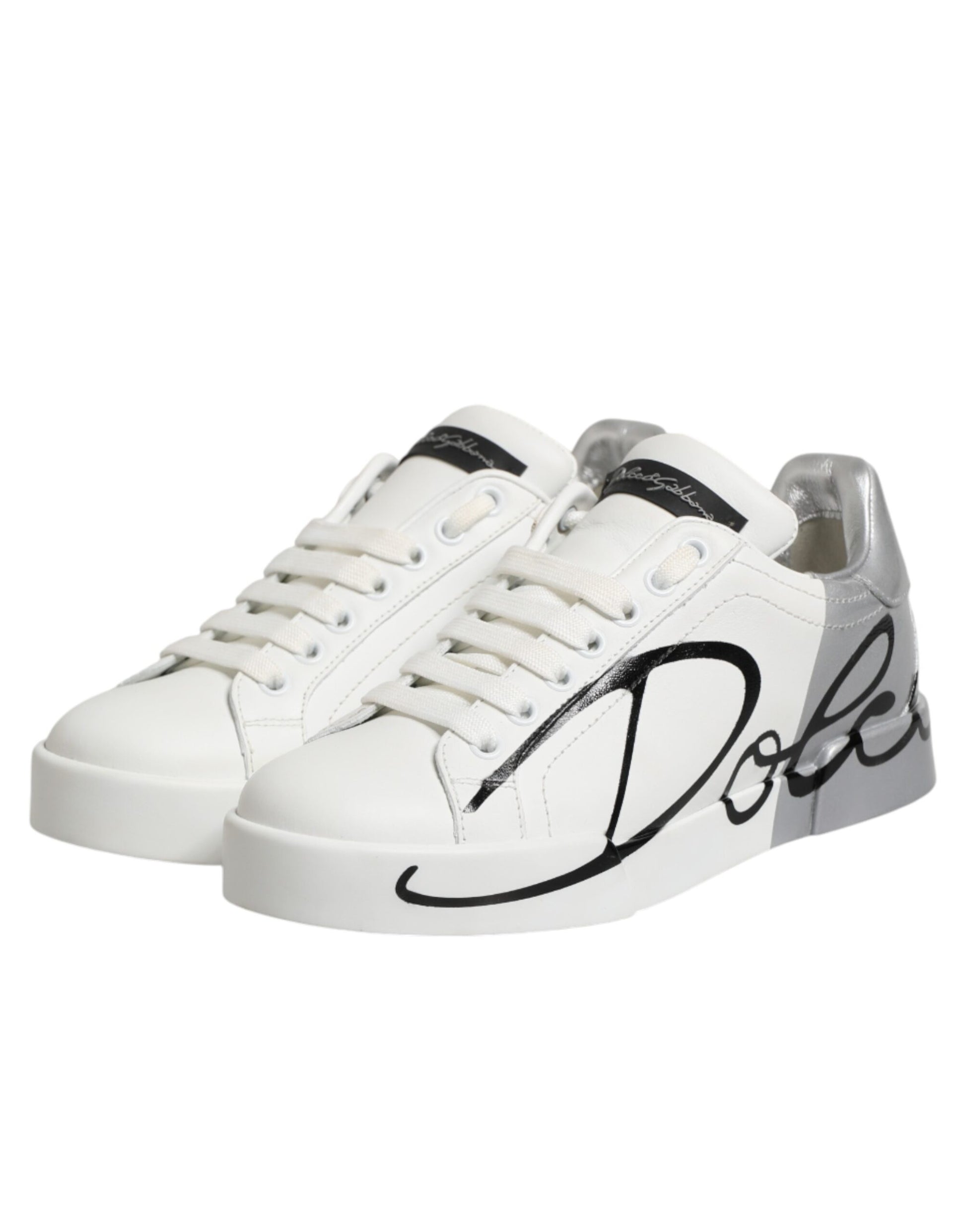 White gray leather sneakers with black laces, signature logo on side